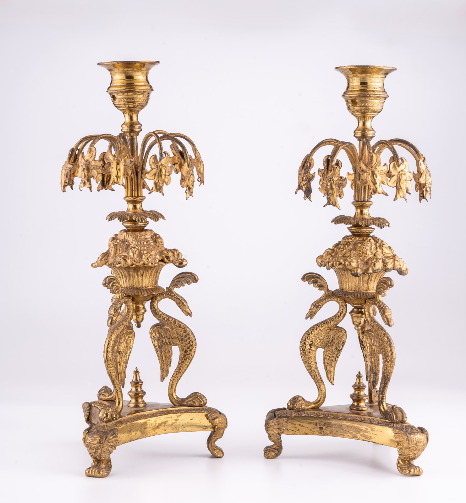 A pair of Regency ormolu candle lustres