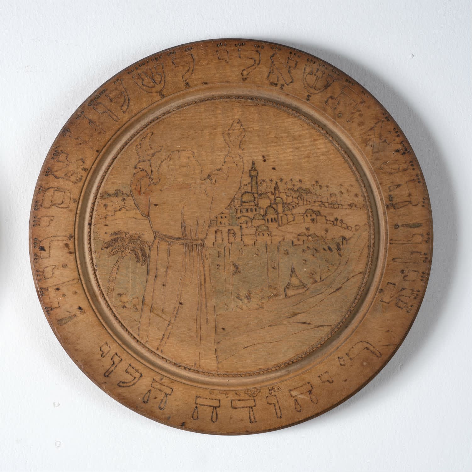 Ben Uri Studio Circular Plate for Ben Uri (Halevi) 1915 Carving on wood 29.5 x 29.5 x 1.4 cm Ben Uri Collection