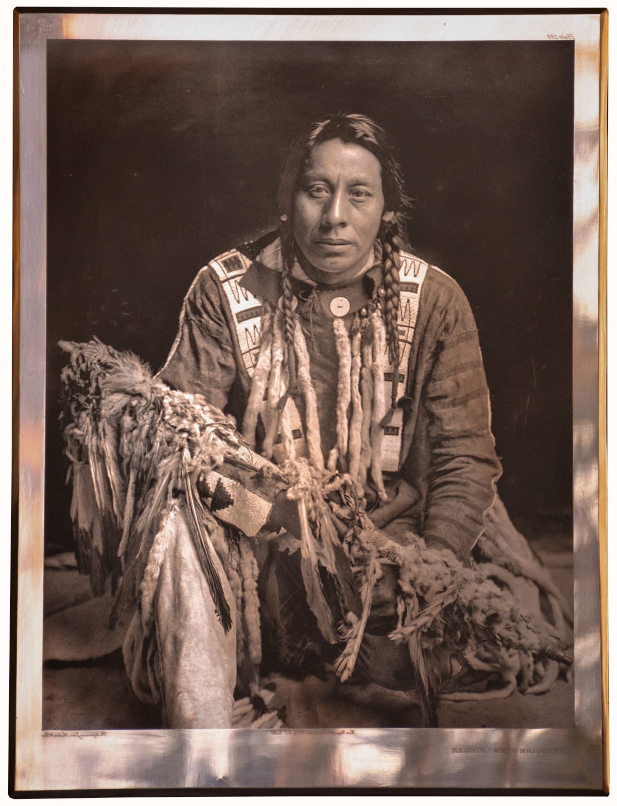 Edward S. Curtis, A Medicine Pipe – Piegan, 1910