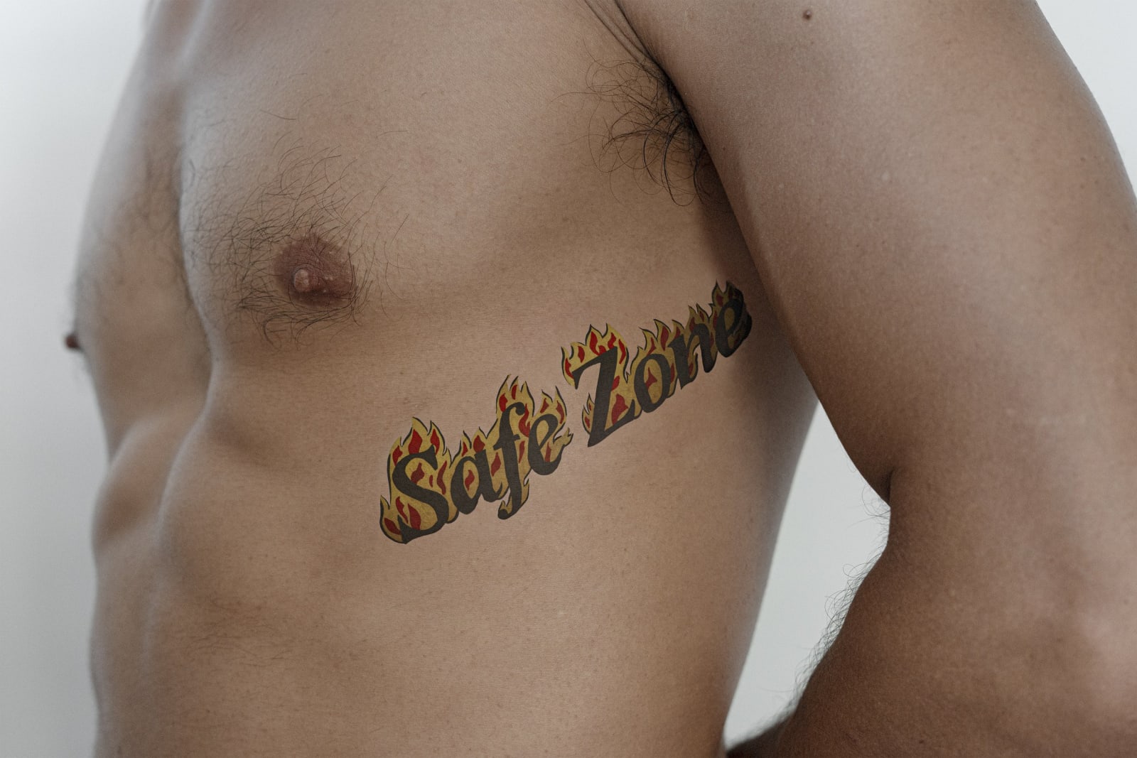 Roee Rosen, Safe Zone, English, 2024, 53.3 X 80 cm, from the series The Gaza War Tattoos, © Roee Rosen