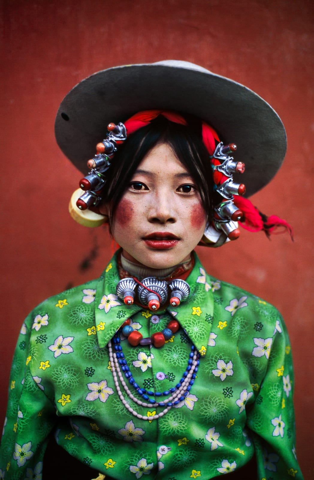 Steve McCurry, Woman at Horse Festival, Tagong, Tibet , 1999