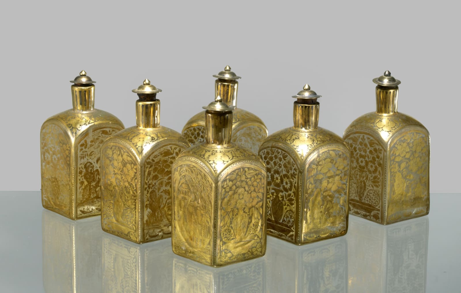 Rare Group of Six Mould-blown and Gold Painted Square Glass Bottles, Probably Gujarat, West India, or Deccan, for the European market, 18th century
