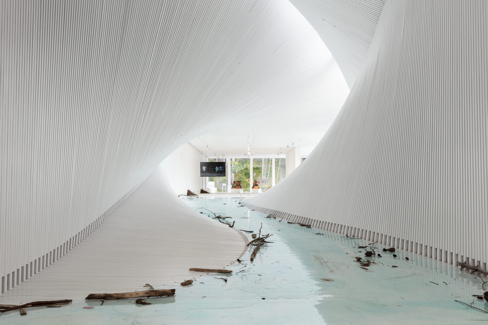 Across the River with Her, 2021, film installation, resin, glass, found objects. Courtesy of the artist and Kistefos Museum. Photo/...