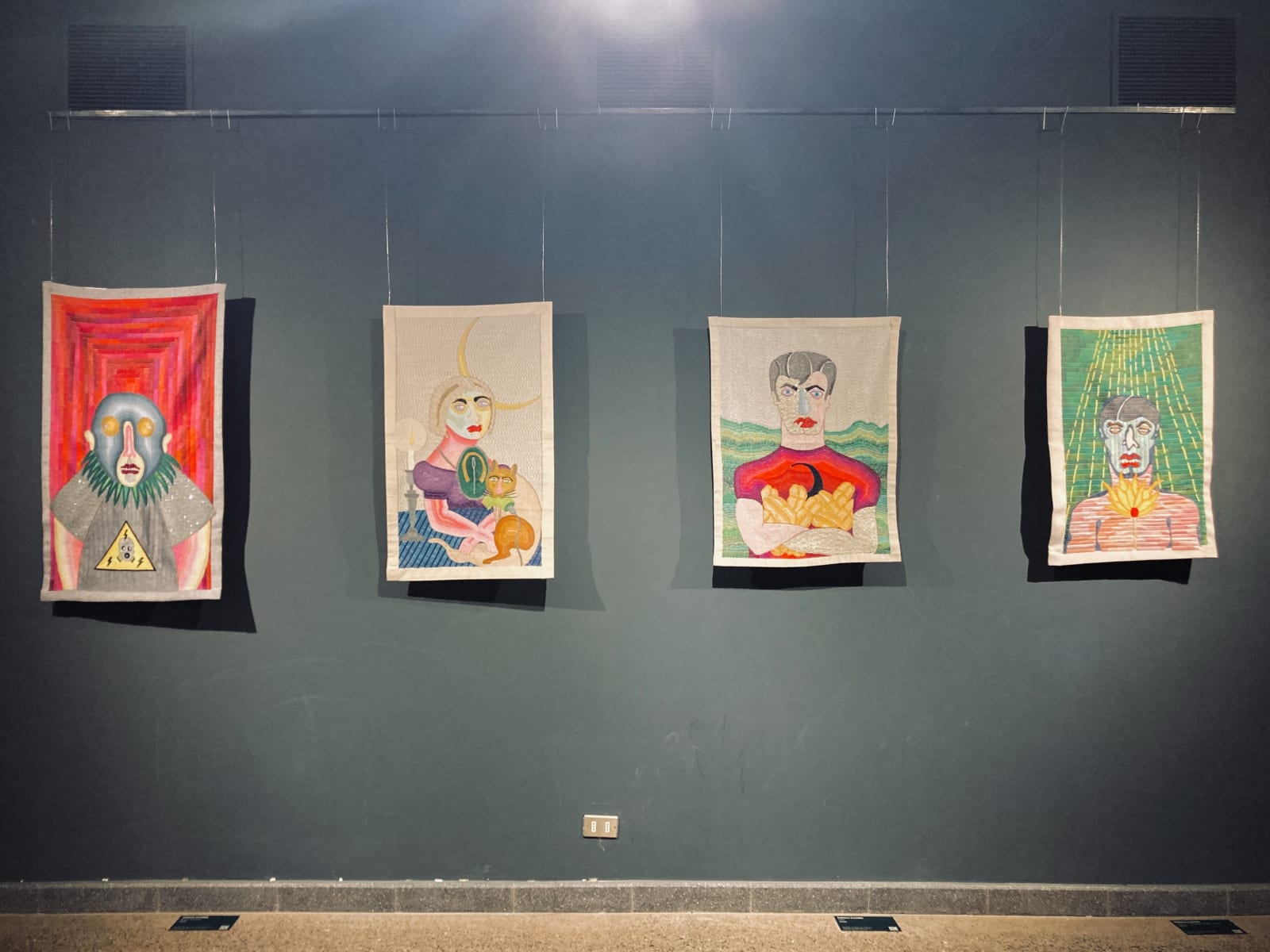 Installation view of embroideries by Paloma Castillo in Festival de la Primavera, main section at the I Biennial of Textile...