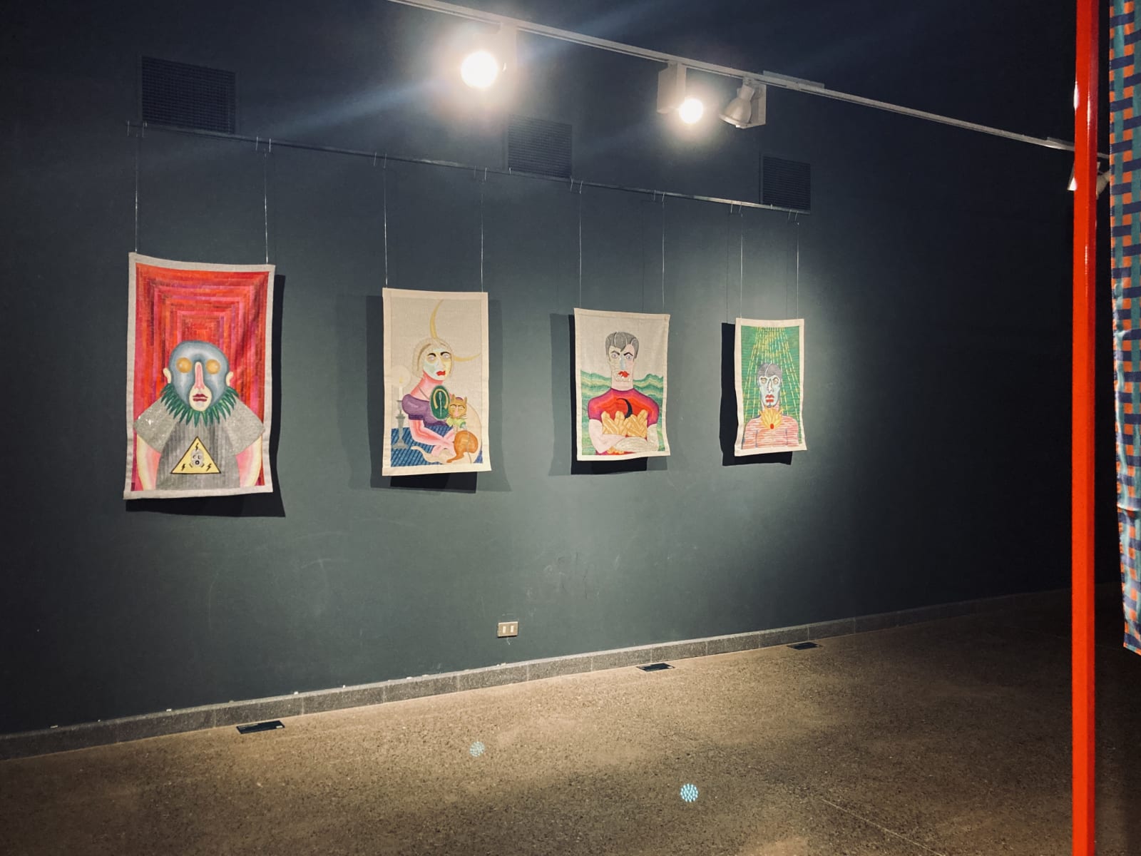 Installation view of embroideries by Paloma Castillo in Festival de la Primavera, main section at the I Biennial of Textile...