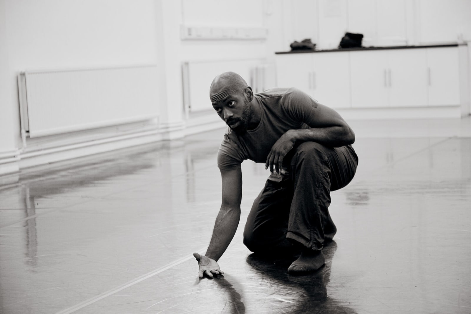 Dickson Mbi in rehearsal. Photo Credit: Chris McAndrew.
