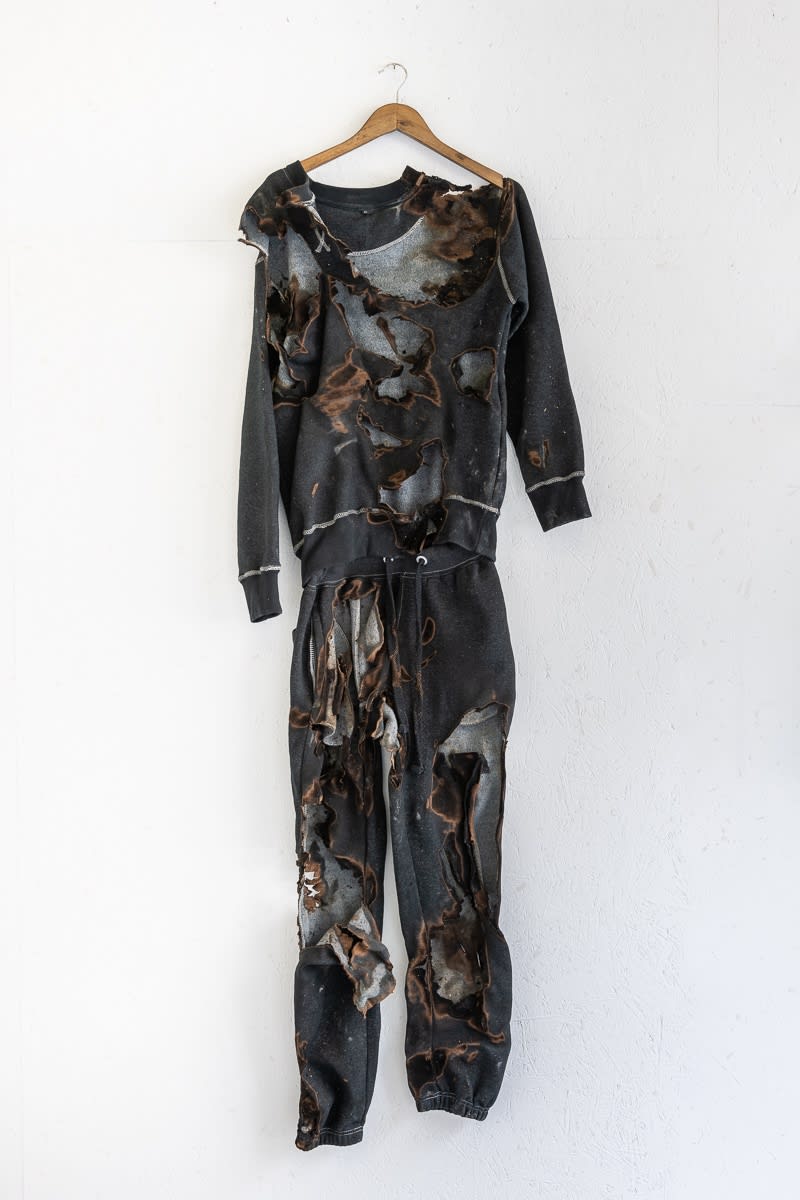 Kobby Adi (for now), 2019 Burnt tracksuit 180 x 60 cm