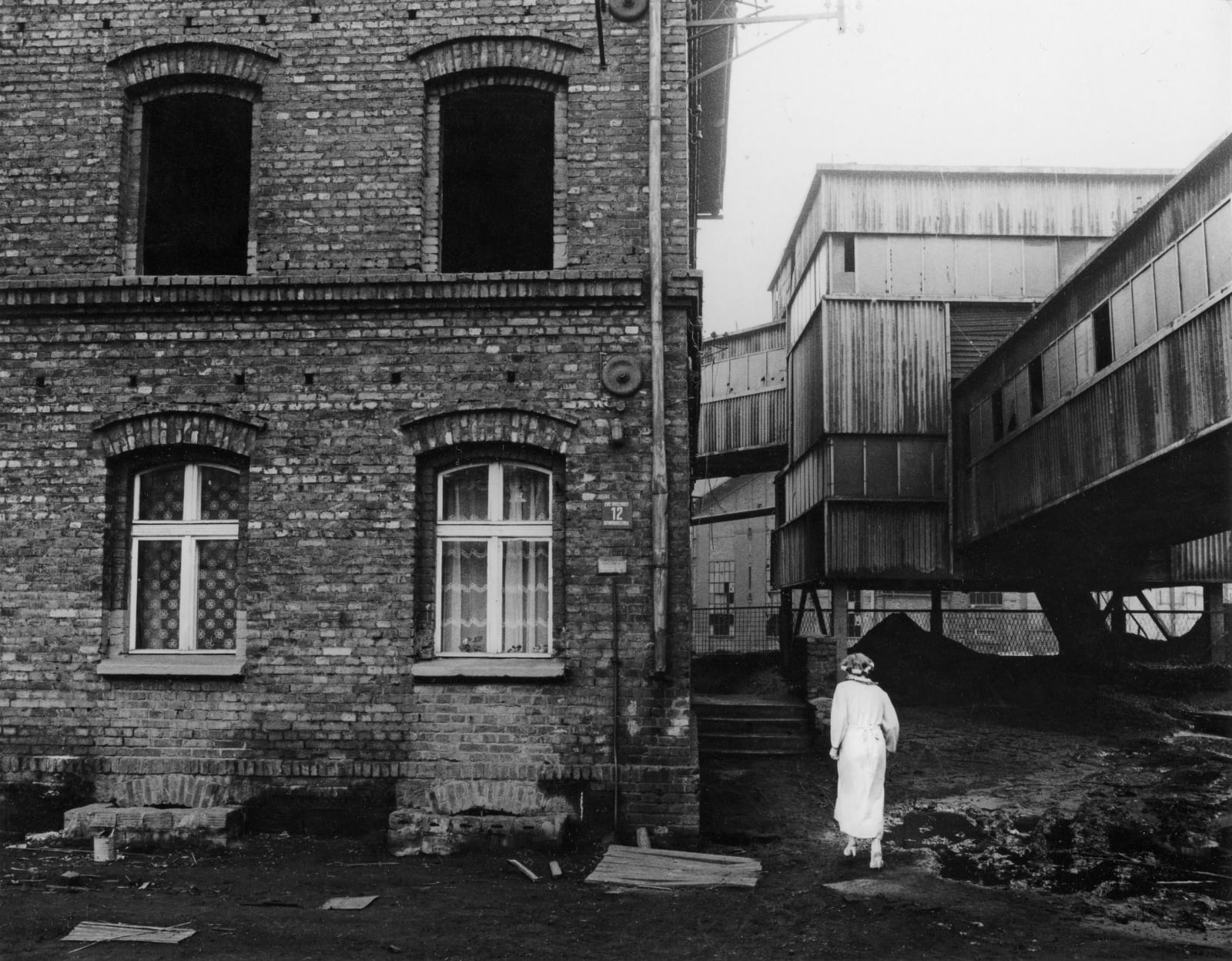 Michal Cala, 'A woman in curls'/ Housing estate next to Wieczorek coalmine, Katowice - Janow, Poland, 1985