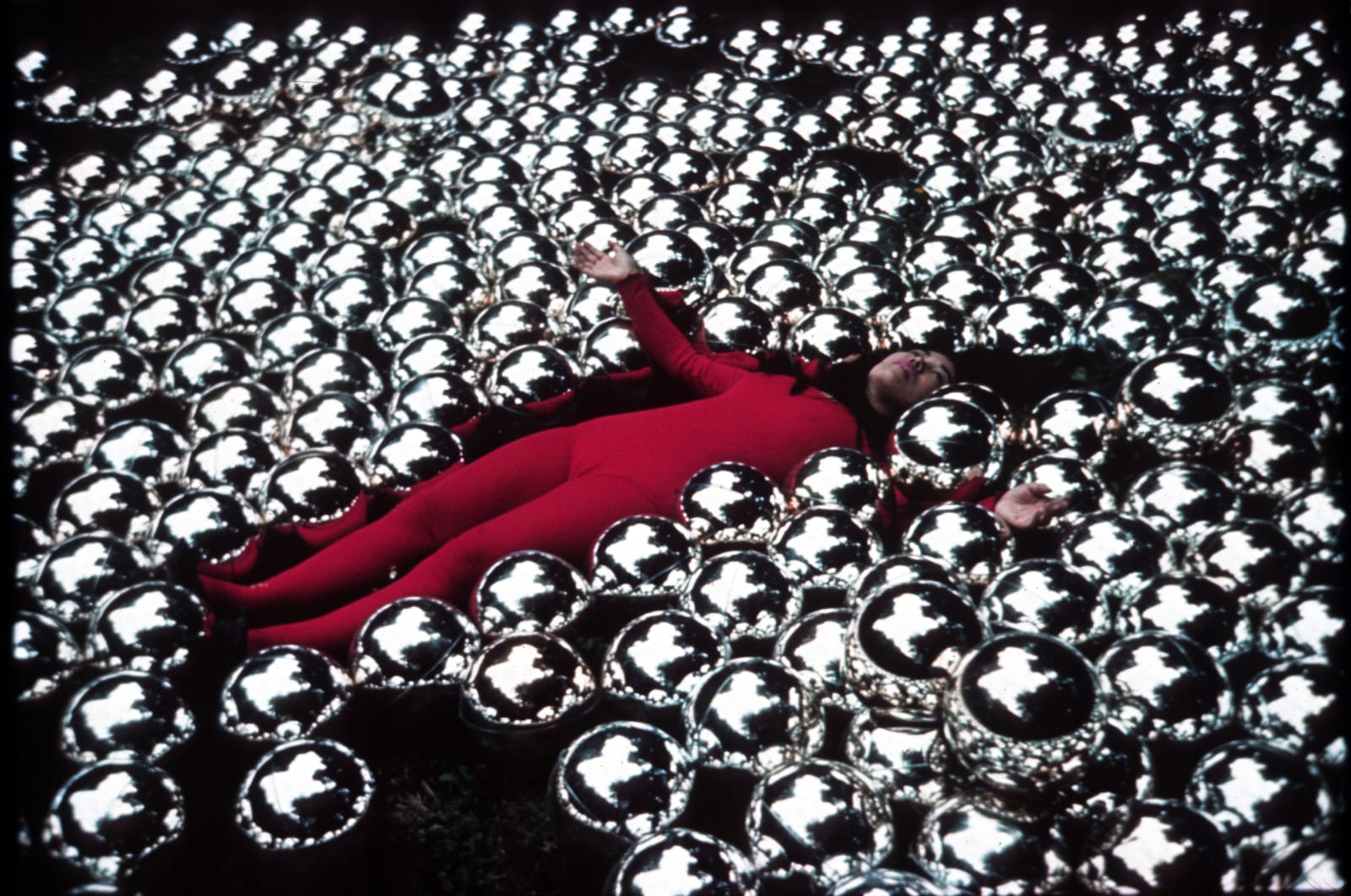 Kusama with her installation Narcissus Garden at the 33. Venice Biennale, 1966 © YAYOI KUSAMA