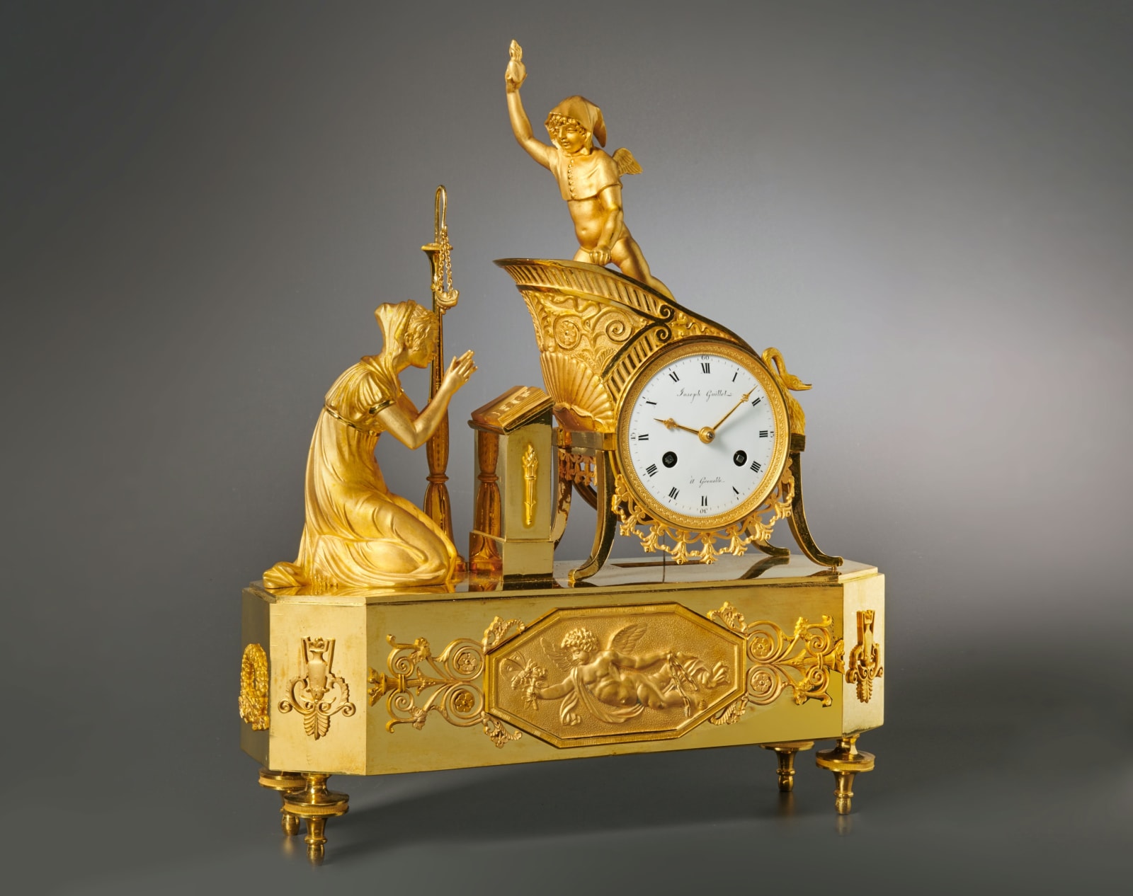 Joseph Guillet, A Charles X gilt bronze mantel clock by Joseph Guillet, the case influenced by Ovid’s Ars Amatoria (The Art of Love)., Grenoble, date circa 1810