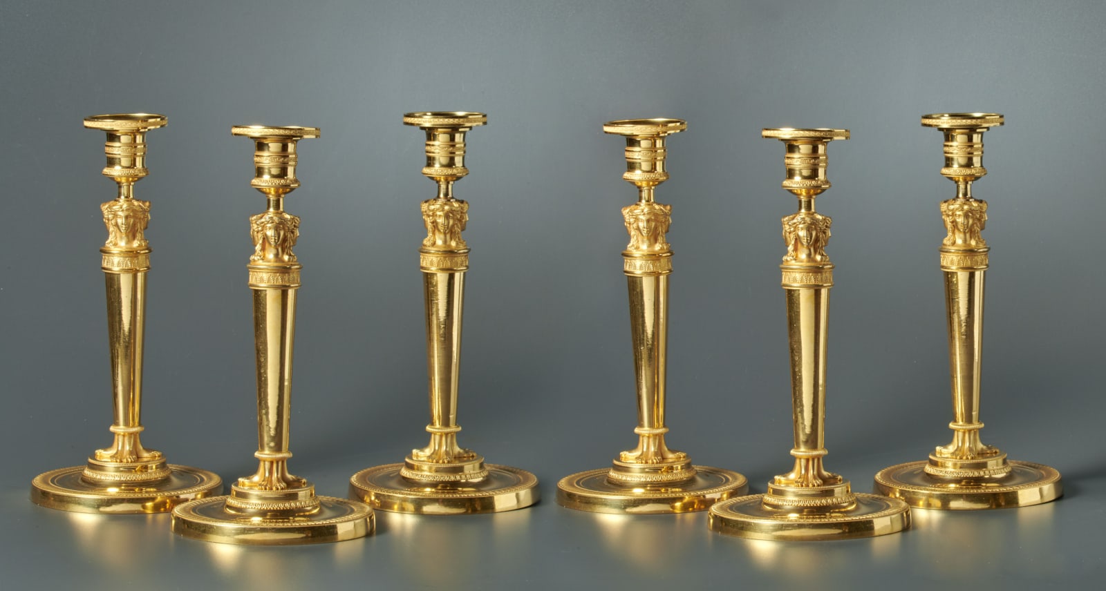 Unknown, A set of six Empire candlesticks, Paris, date circa 1810
