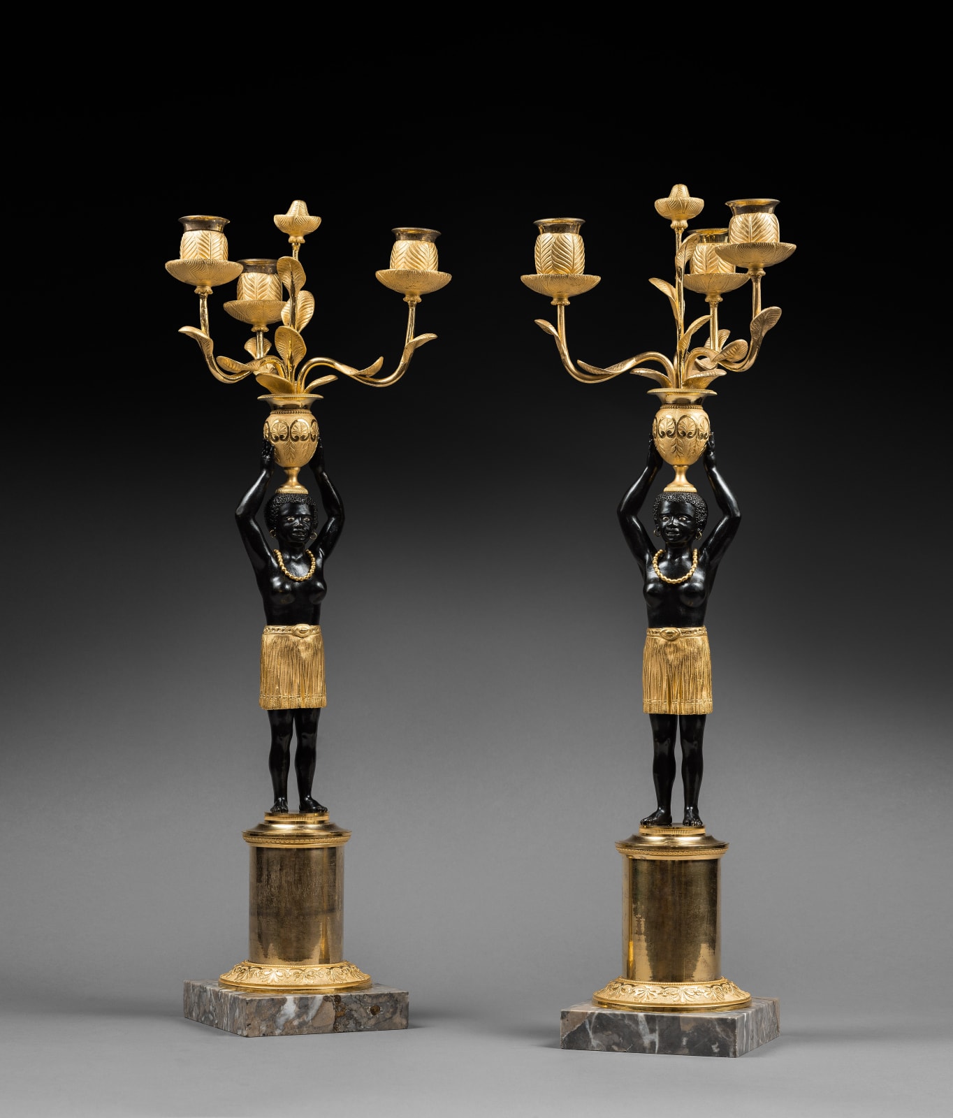 Jean-Simon Deverberie (attributed to), A pair of Directoire three-light candelabra ‘Au Jeune Nègre’, attributed to Jean-Simon Deverberie, Paris, date circa 1800