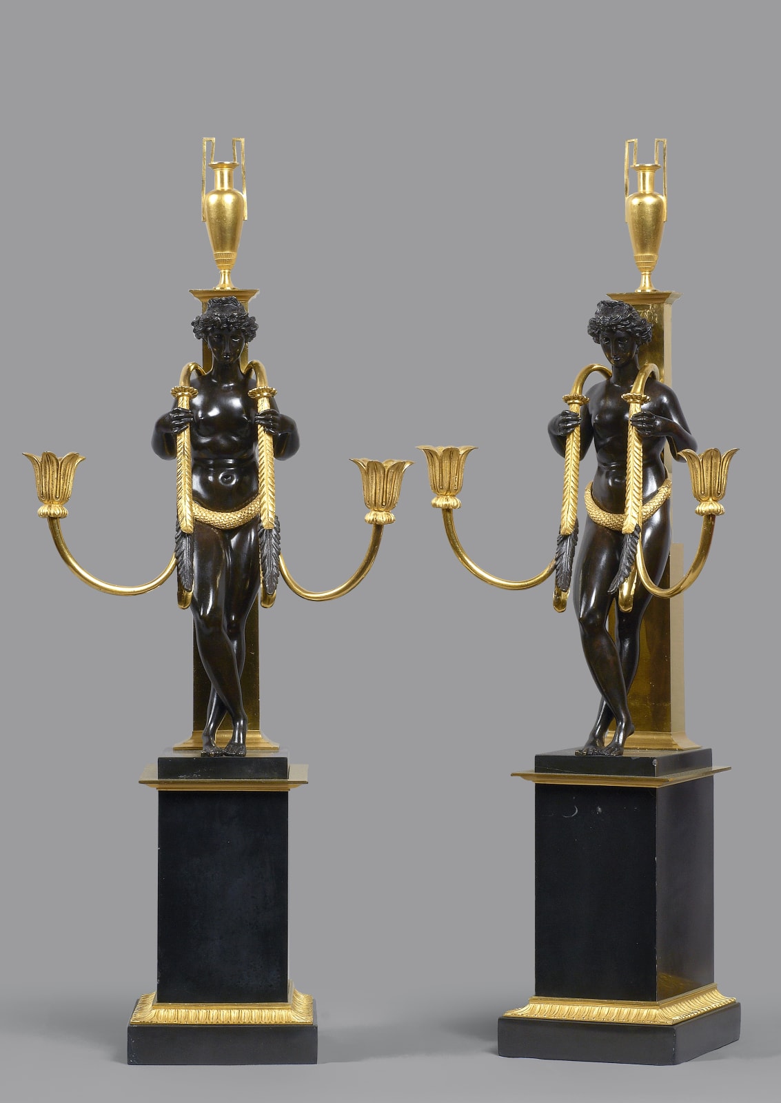 Pierre-Philippe Thomire (attributed to), A pair of Directoire two-light candelabra attributed to Pierre-Philippe Thomire, Paris, date circa 1800