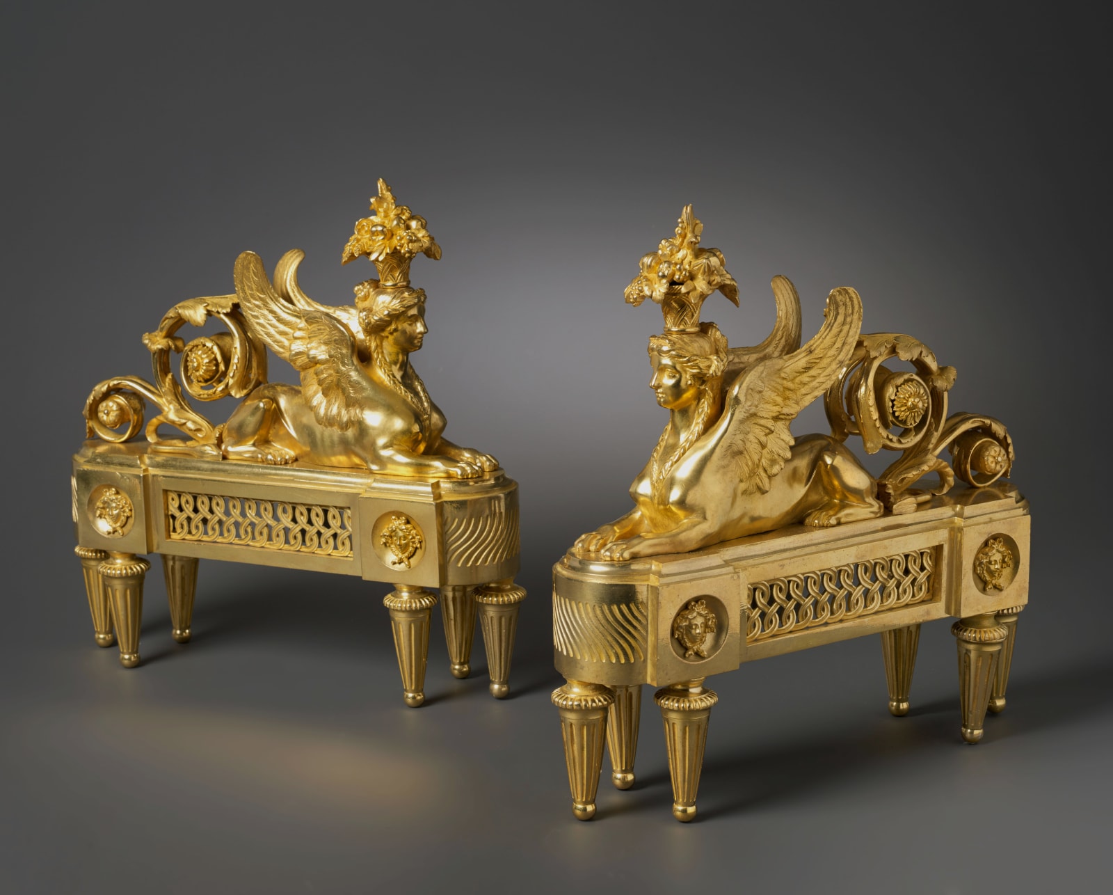 François-Joseph Bélanger (after), A pair of Louis XVI chenets almost certainly after a design by François-Joseph Bélanger, Paris, date 1780