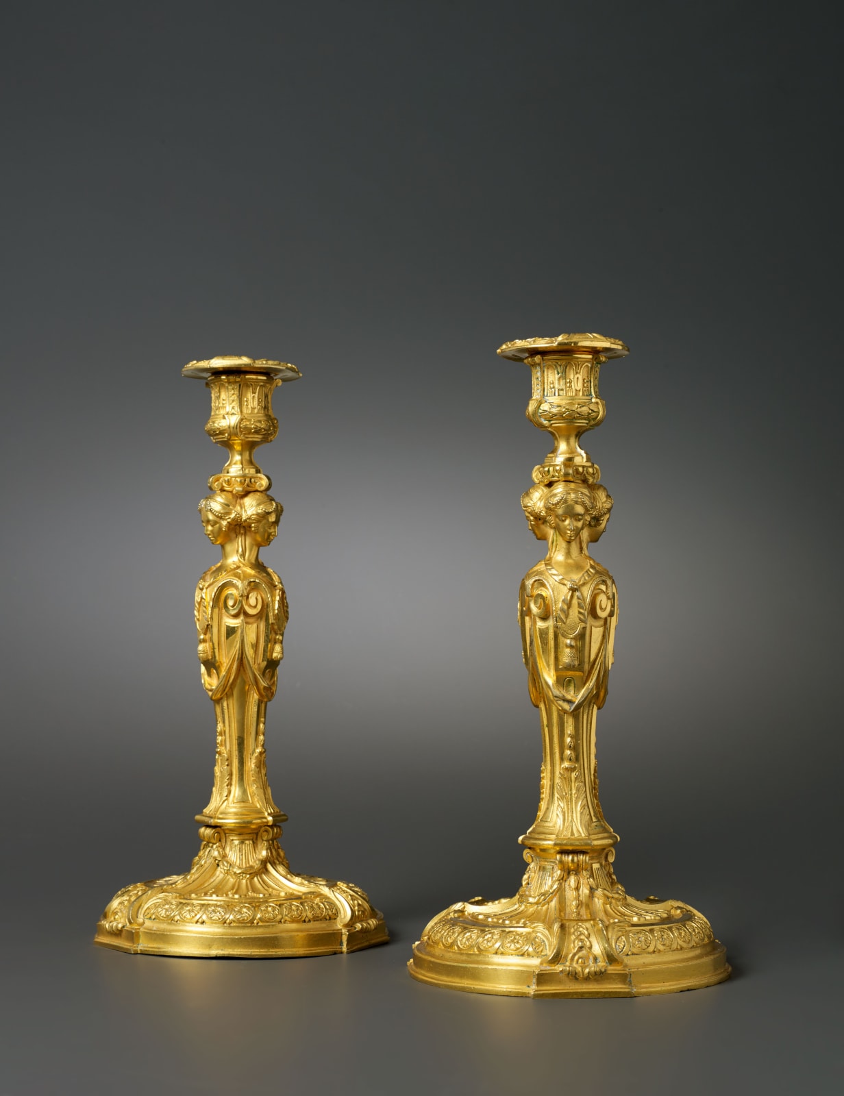 Jean-Démosthène Dugourc (after), A pair of Louis XVI candlesticks after a model by Jean-Démosthène Dugourc, Paris, date circa 1785