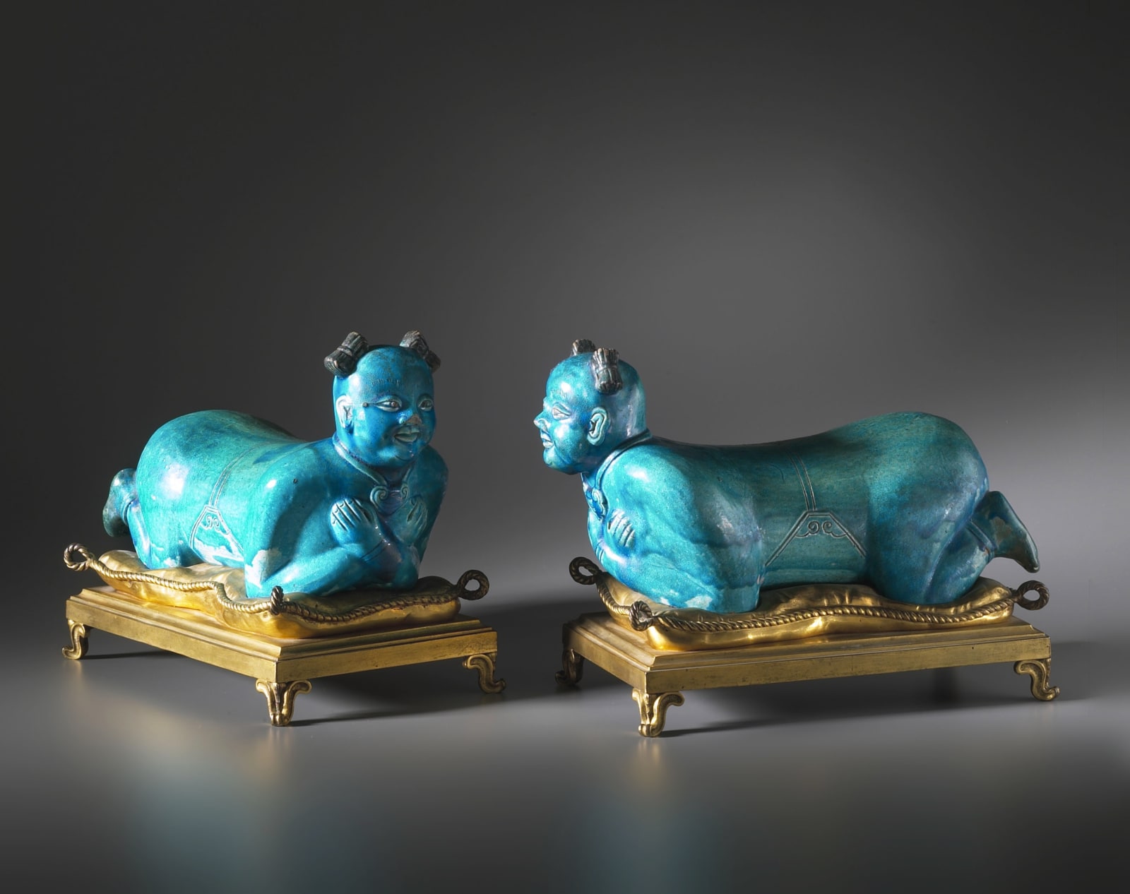 Unknown, A pair of Chinese Ming Dynasty pillows, The porcelain pillows: Early seventeenth century, late Ming Dynasty. The gilt bronze: French late eighteenth century or early nineteenth century.