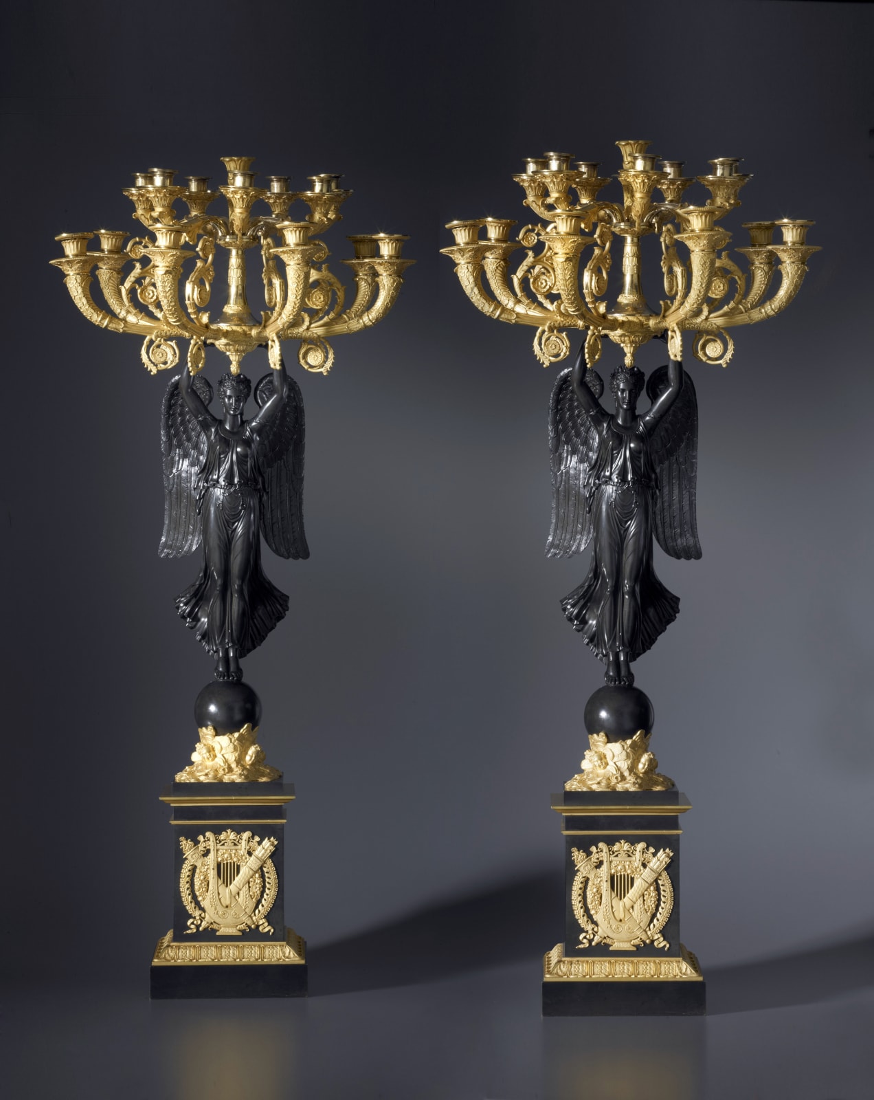 Pierre-Philippe Thomire (attributed to), A pair of Empire fourteen-light candelabra attributed to Pierre-Philippe Thomire after a design by Charles Percier, Paris, date circa 1810