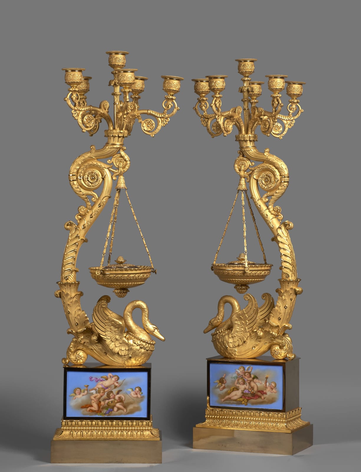 Pierre-Philippe Thomire (attributed to), A pair of Empire six-light candelabra with brûle-parfums attributed to Pierre-Philippe Thomire, Paris, date circa 1815-20