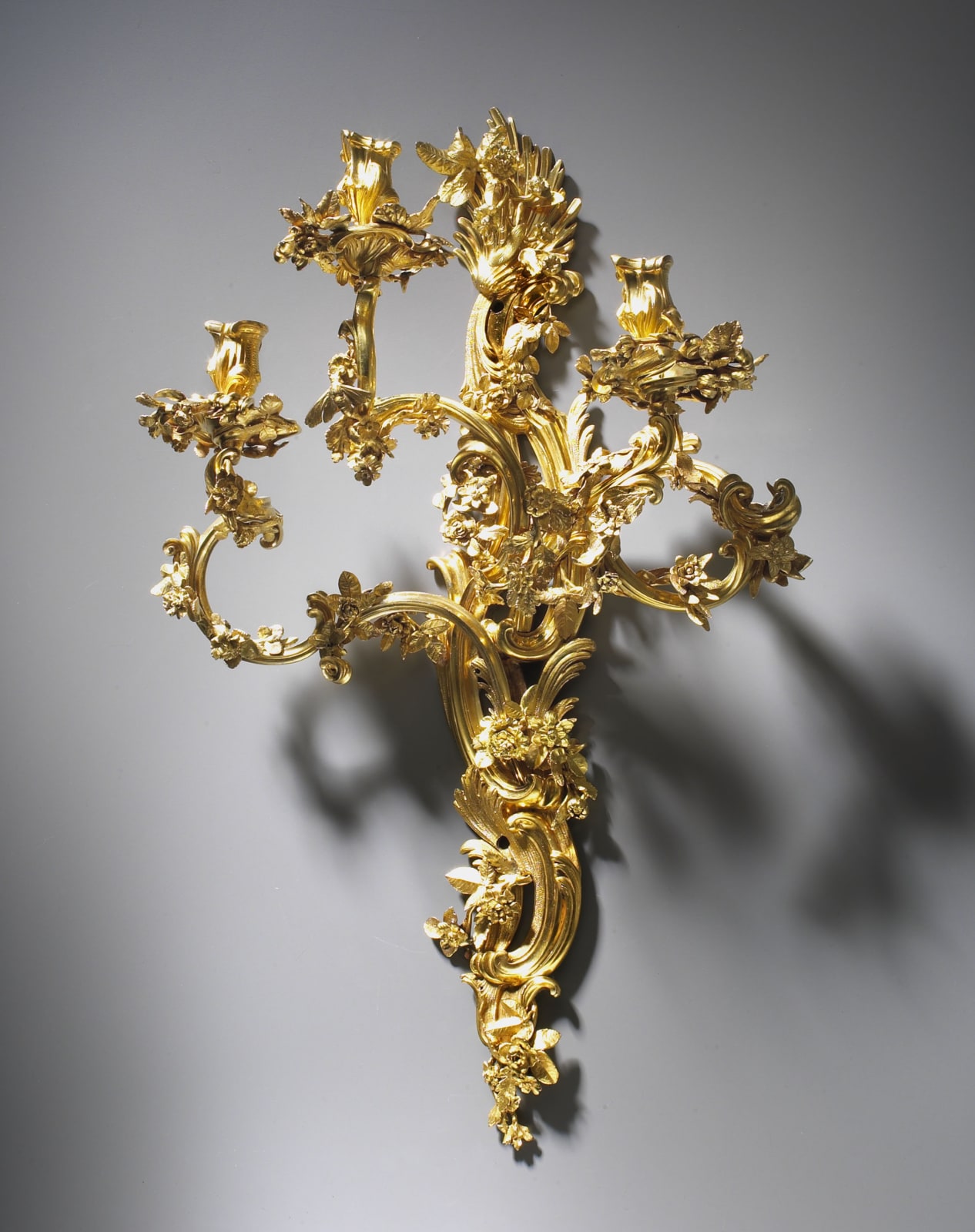 Jacques Caffiéri (attributed to), A pair of Louis XV three-light wall-lights attributed to Jacques Caffiéri, Paris, date circa 1745