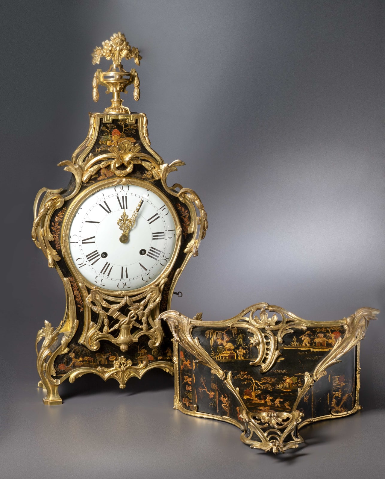 Adrien-Jérôme Jollain , A Louis XV Transitional Louis XVI grande cartel clock with bracket housed in a case by Adrien-Jérôme Jollain, Paris, date 1765-75