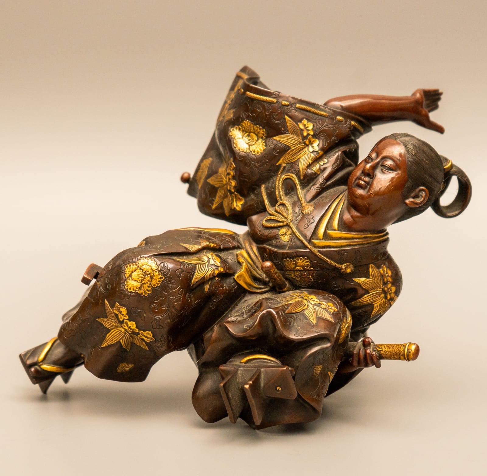 Unknown, A JAPANESE NINETEENTH CENTURY MEIJI PERIOD GILT AND PATINATED BRONZE FIGURE OF A SAMURAI WARRIOR , Japan, Meiji period, date circa 1880