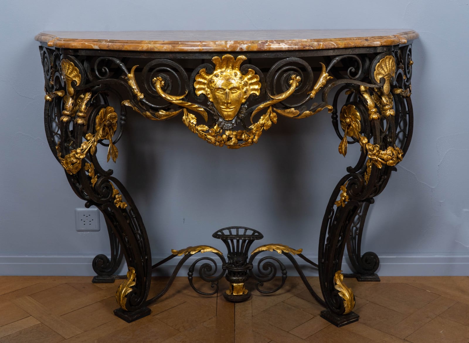 A LOUIS XV WROUGHT IRON, PARCEL GILT AND SIENNA MARBLE CONSOLE TABLE, Provence, most probably Comtat Venaissin, date circa 1740