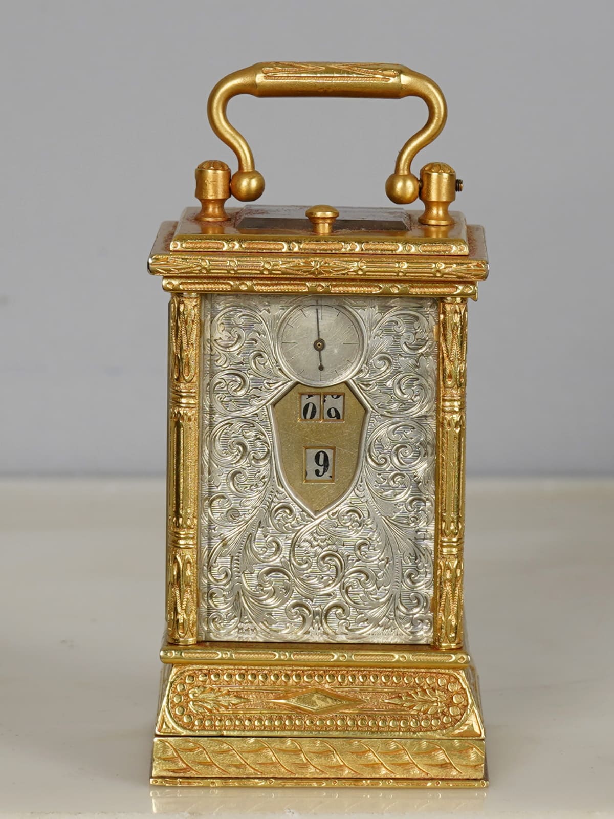 Unknown, A miniature carriage clock with digital dial, Switzerland, date circa 1900