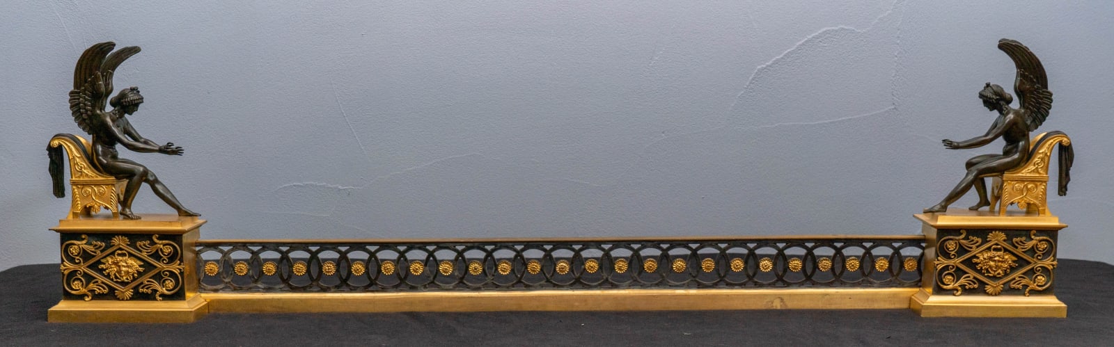 An Empire gilt and patinated bronze fender, Paris, date circa 1815-1820