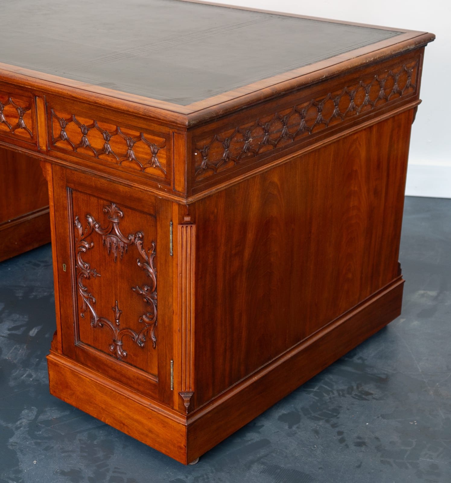 attributed to Wright and Mansfield of London, A VICTORIAN MAHOGANY CHIPPENDALE-STYLE PEDESTAL DESK , London, date circa 1875
