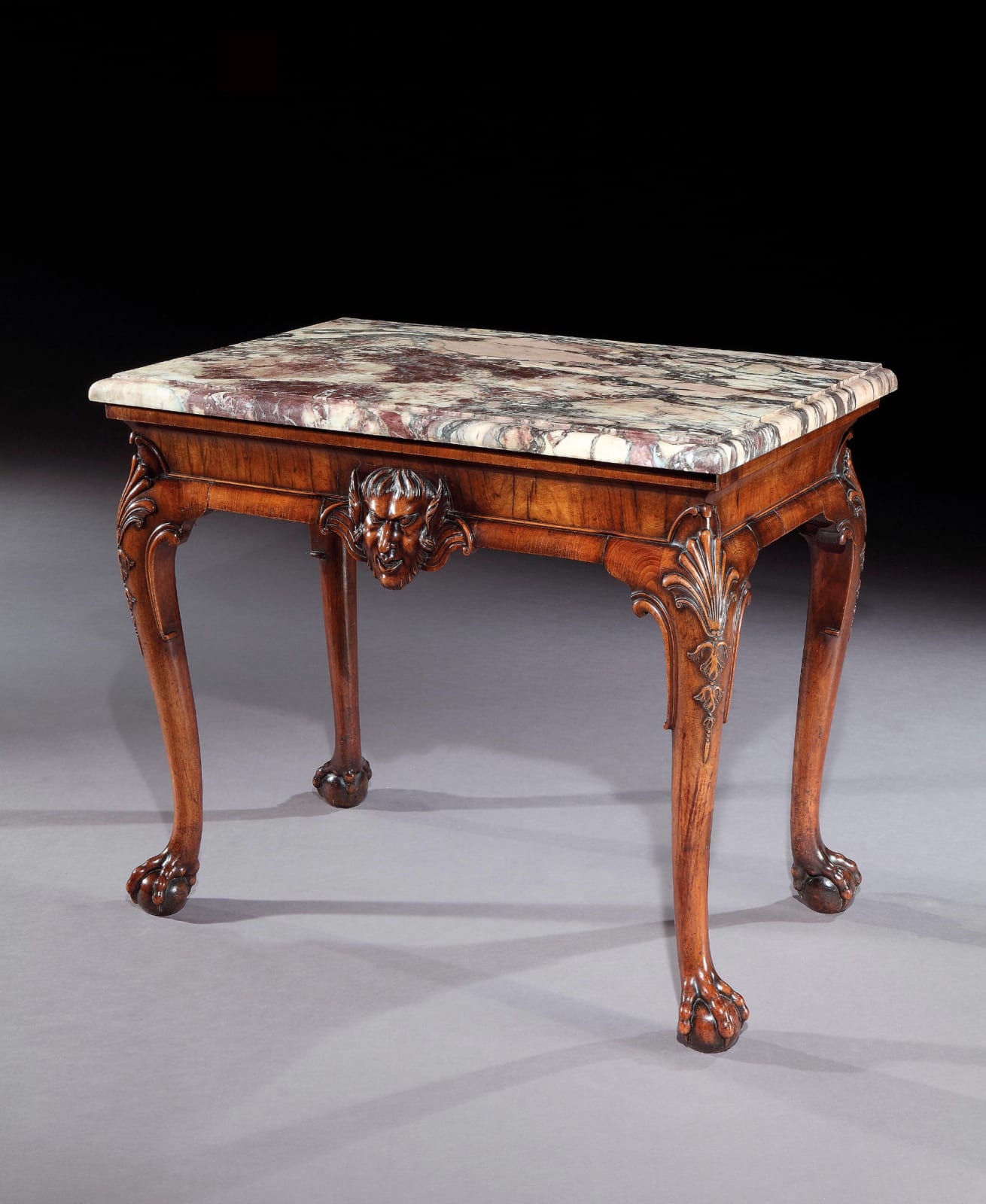 A GEORGE II CARVED WALNUT SIDE TABLE ATTRIBUTED TO GILES GRENDEY, ENGLISH, CIRCA 1740