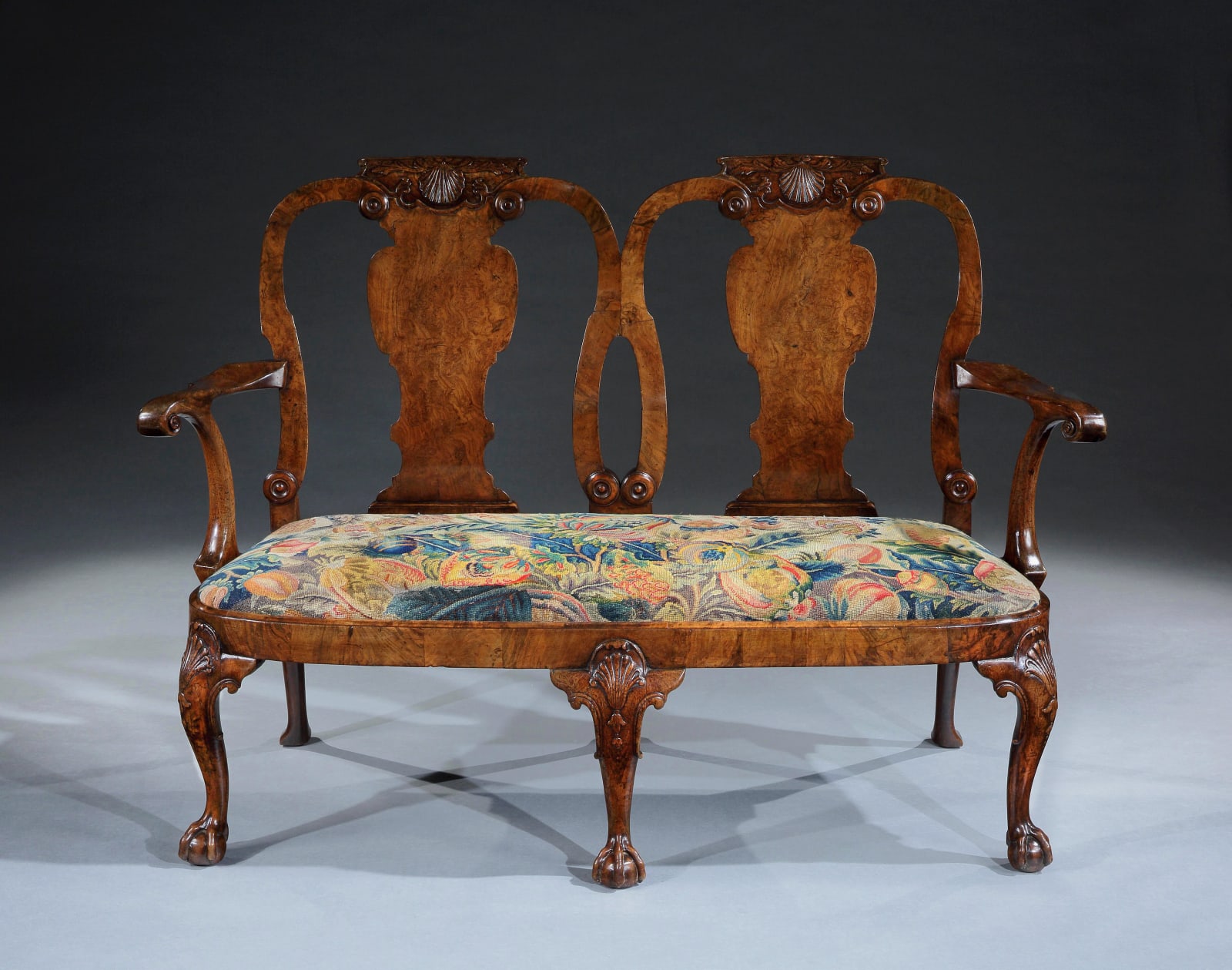 A GEORGE I WALNUT AND BURR WALNUT CHAIR-BACK SETTEE, ENGLISH, CIRCA 1720