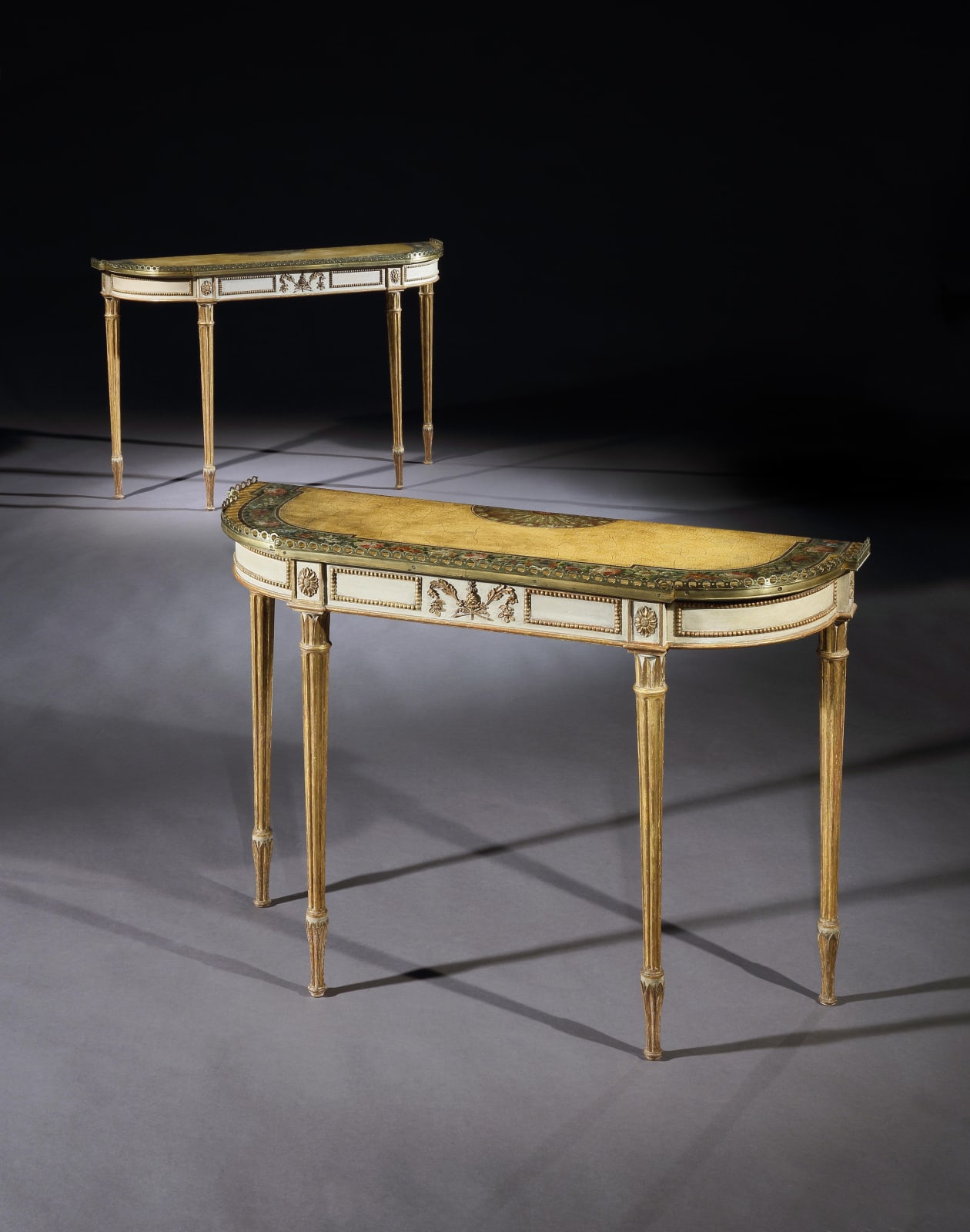 A PAIR OF GEORGE III PAINTED AND GILDED SIDE TABLES ATTRIBUTED TO SEDDON & SONS, ENGLISH, CIRCA 1790