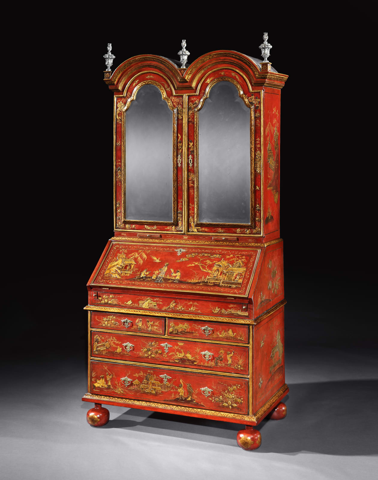 A QUEEN ANNE SCARLET AND GILT-JAPANNED BUREAU-BOOKCASE, ENGLISH, CIRCA 1710