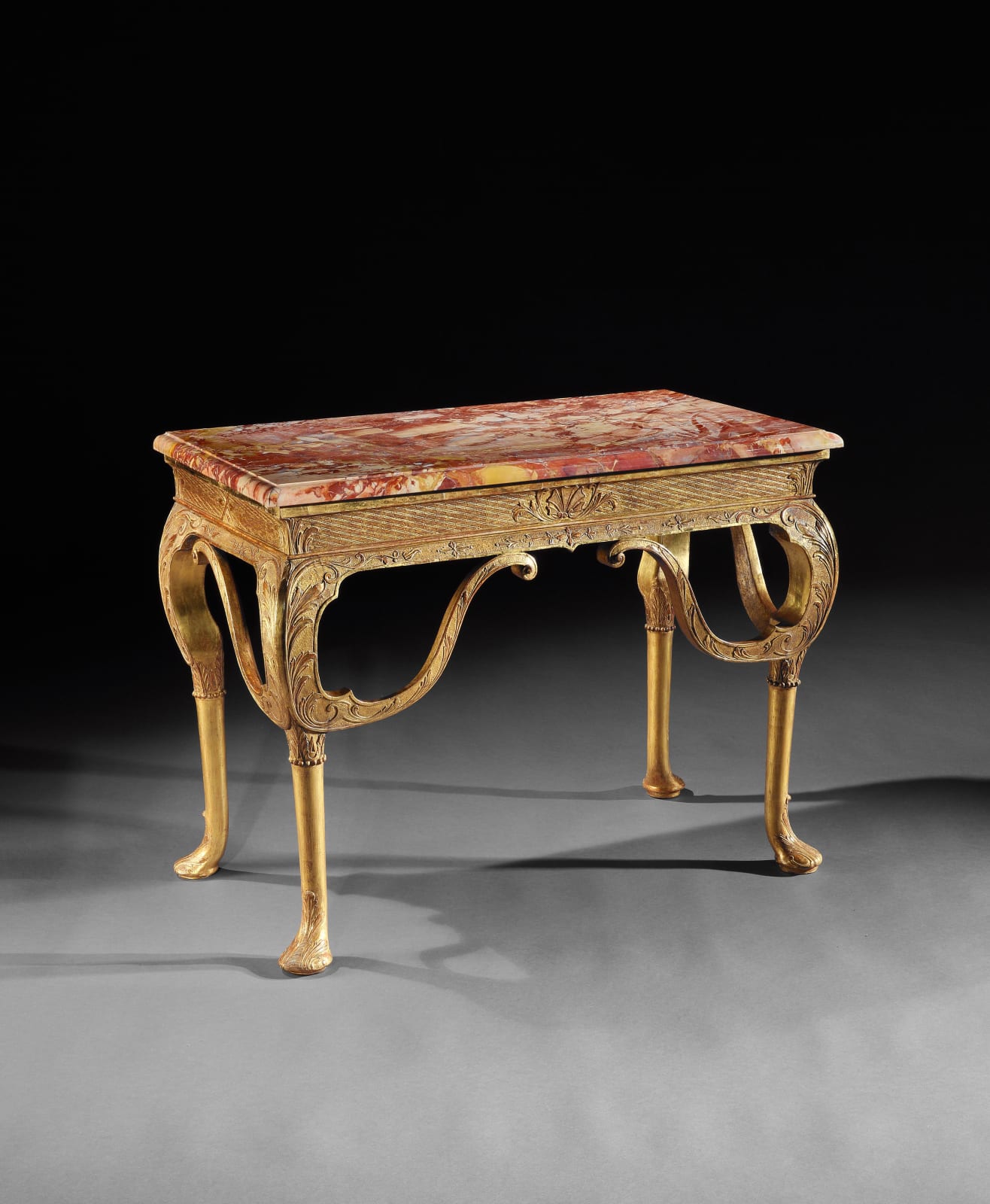 A GEORGE I GILTWOOD SIDE TABLE ATTRIBUTED TO JAMES MOORE, ENGLISH, CIRCA 1720