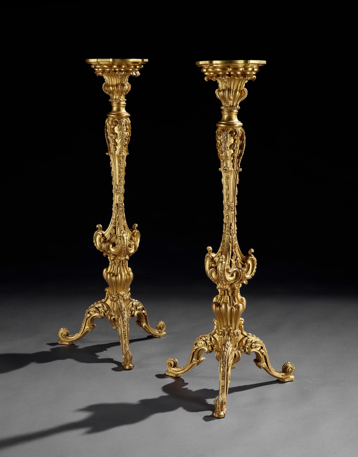 A PAIR OF GEORGE III CARVED & GILDED TORCHERES, ENGLISH, CIRCA 1760