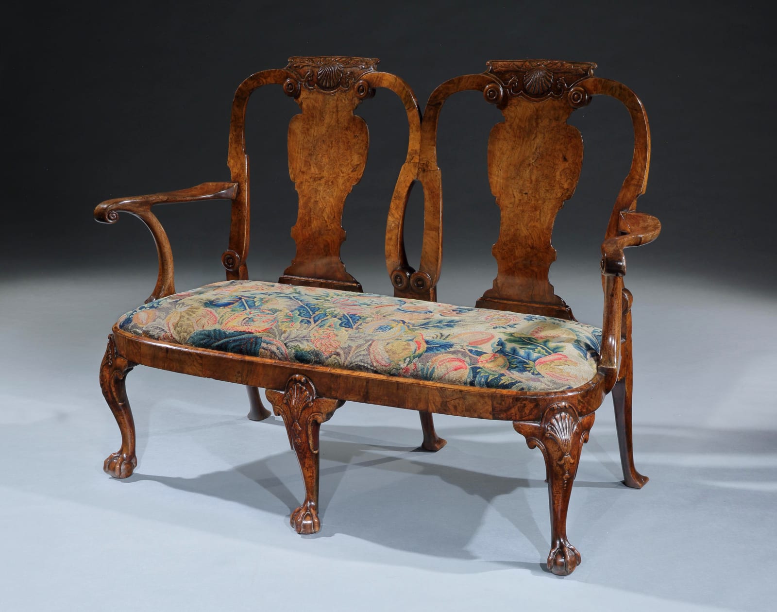 A GEORGE I WALNUT AND BURR WALNUT CHAIR-BACK SETTEE, ENGLISH, CIRCA 1720