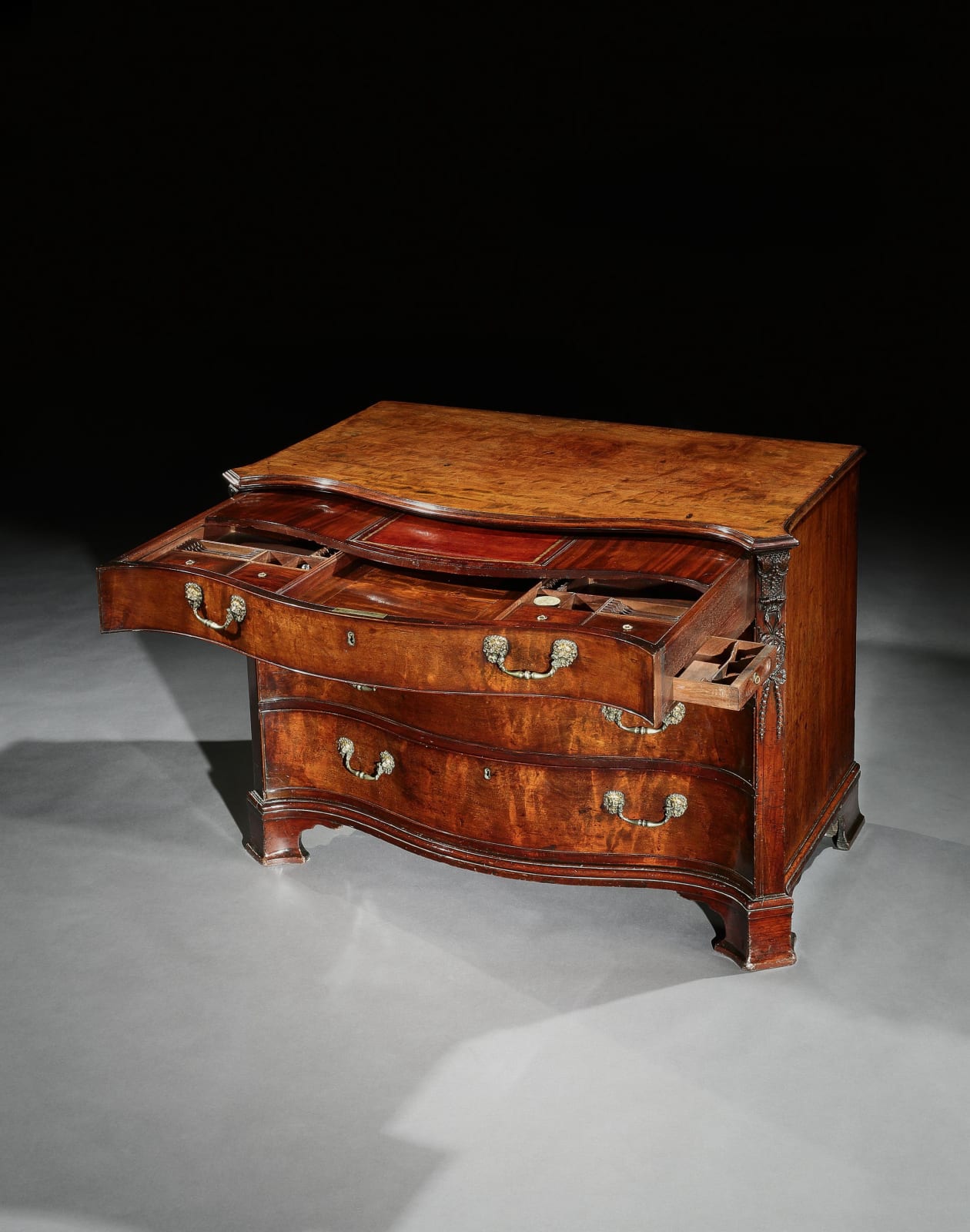THE ATHELHAMPTON HOUSE MAHOGANY COMMODE, ENGLISH, CIRCA 1765