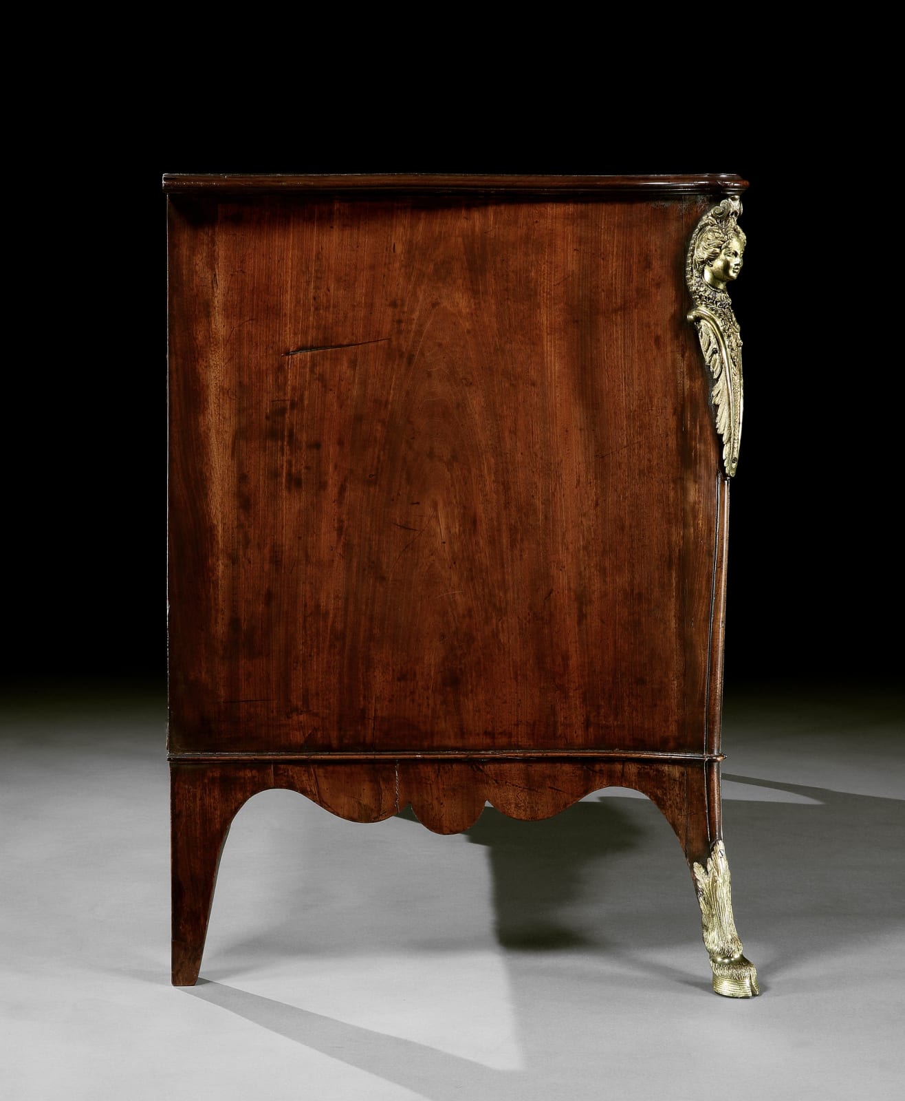 A GEORGE III MAHOGANY COMMODE ATTRIBUTED TO JOHN COBB, ENGLISH, CIRCA 1765