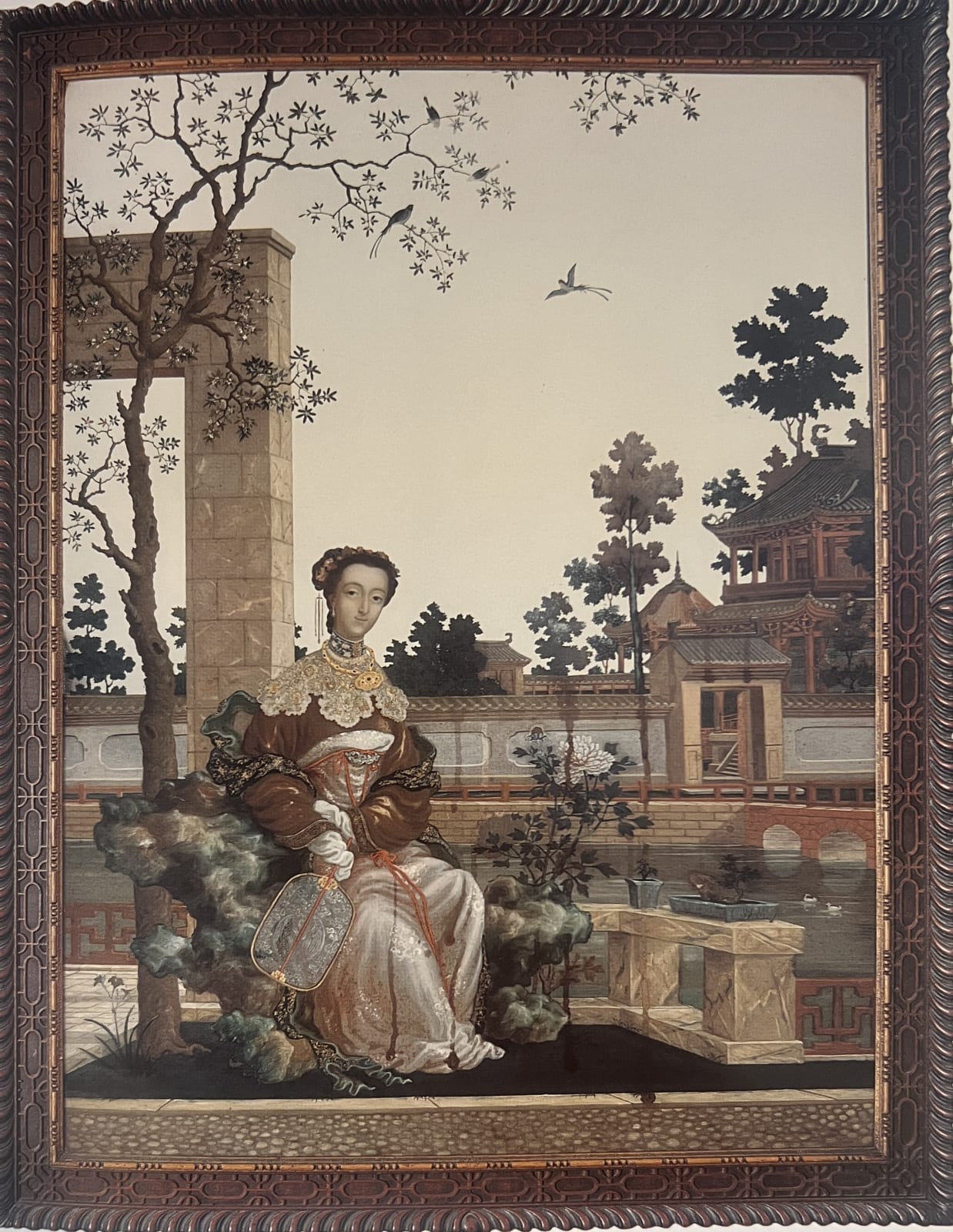 A CHINESE EXPORT GOUACHE ON PAPER PAINTING OF A SEATED LADY, QING DYNASTY, QIANLONG PERIOD (1736 - 95)