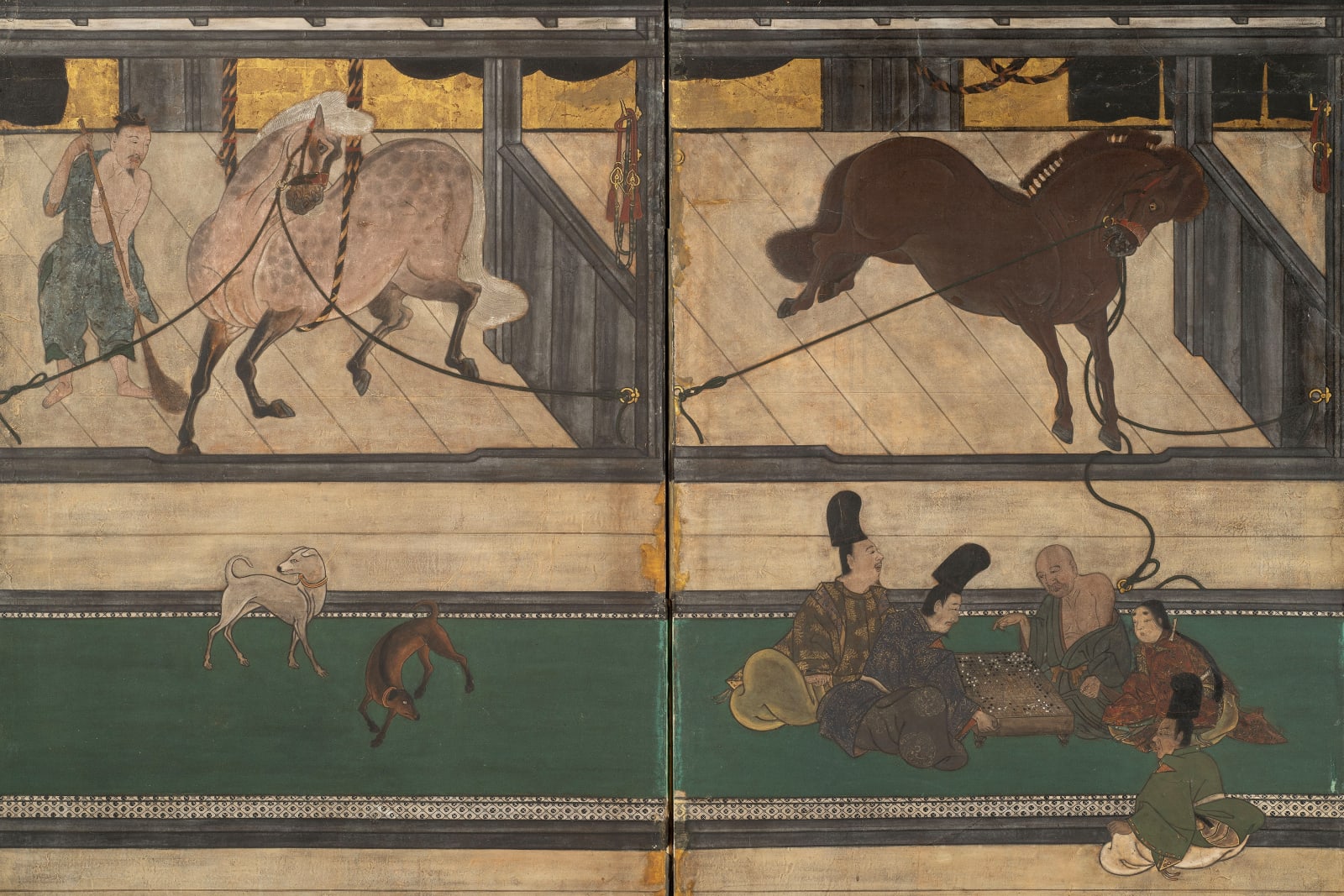 A PAIR OF SIX-FOLD BYŌBU (SCREENS) DEPICTING THE HORSE STABLE, JAPAN, MOMOYAMA (1573 - 1615) - EDO PERIOD (1603 - 1868), c. 1600