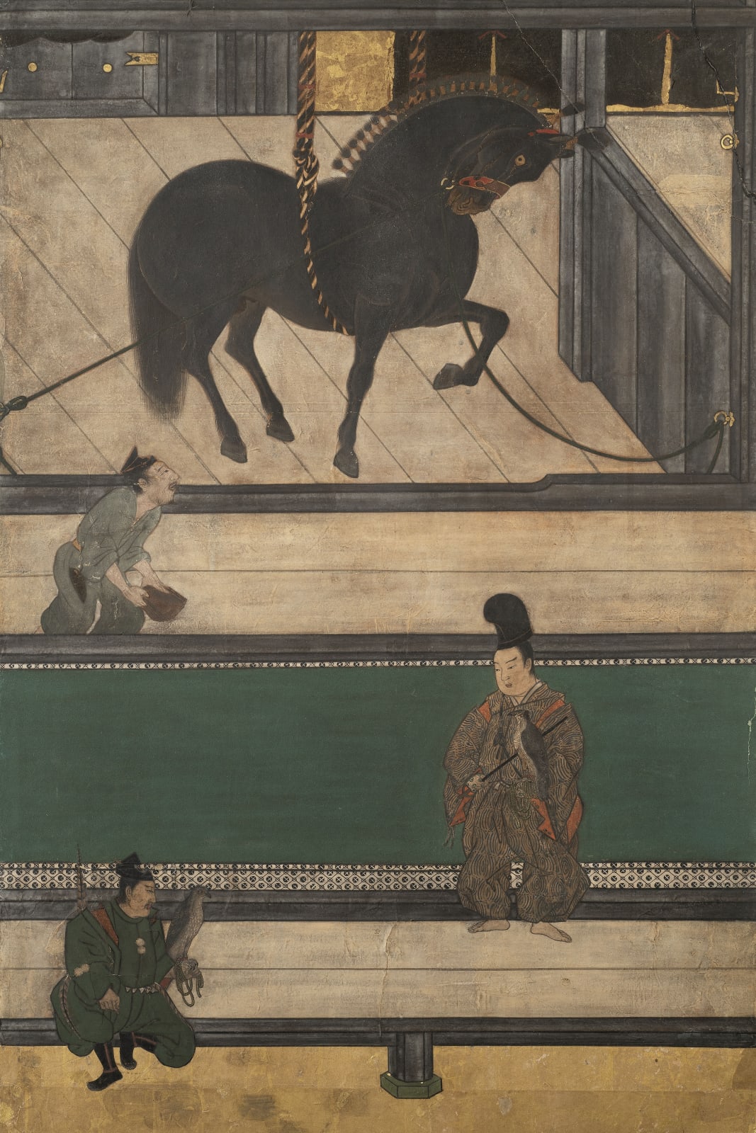 A PAIR OF SIX-FOLD BYŌBU (SCREENS) DEPICTING THE HORSE STABLE, JAPAN, MOMOYAMA (1573 - 1615) - EDO PERIOD (1603 - 1868), c. 1600