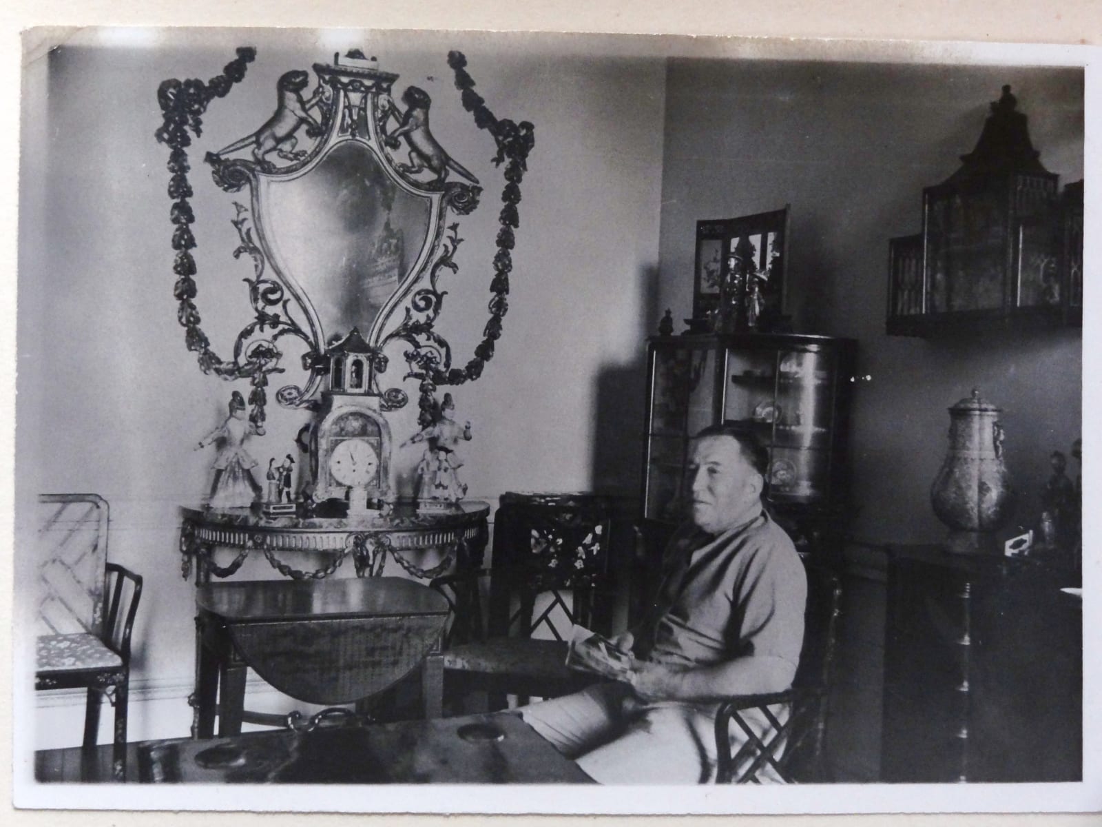A PAIR OF CANTON ENAMEL HU-FORM VASES AND COVERS QIANLONG MARKS AND PERIOD, Chinese, circa 1750