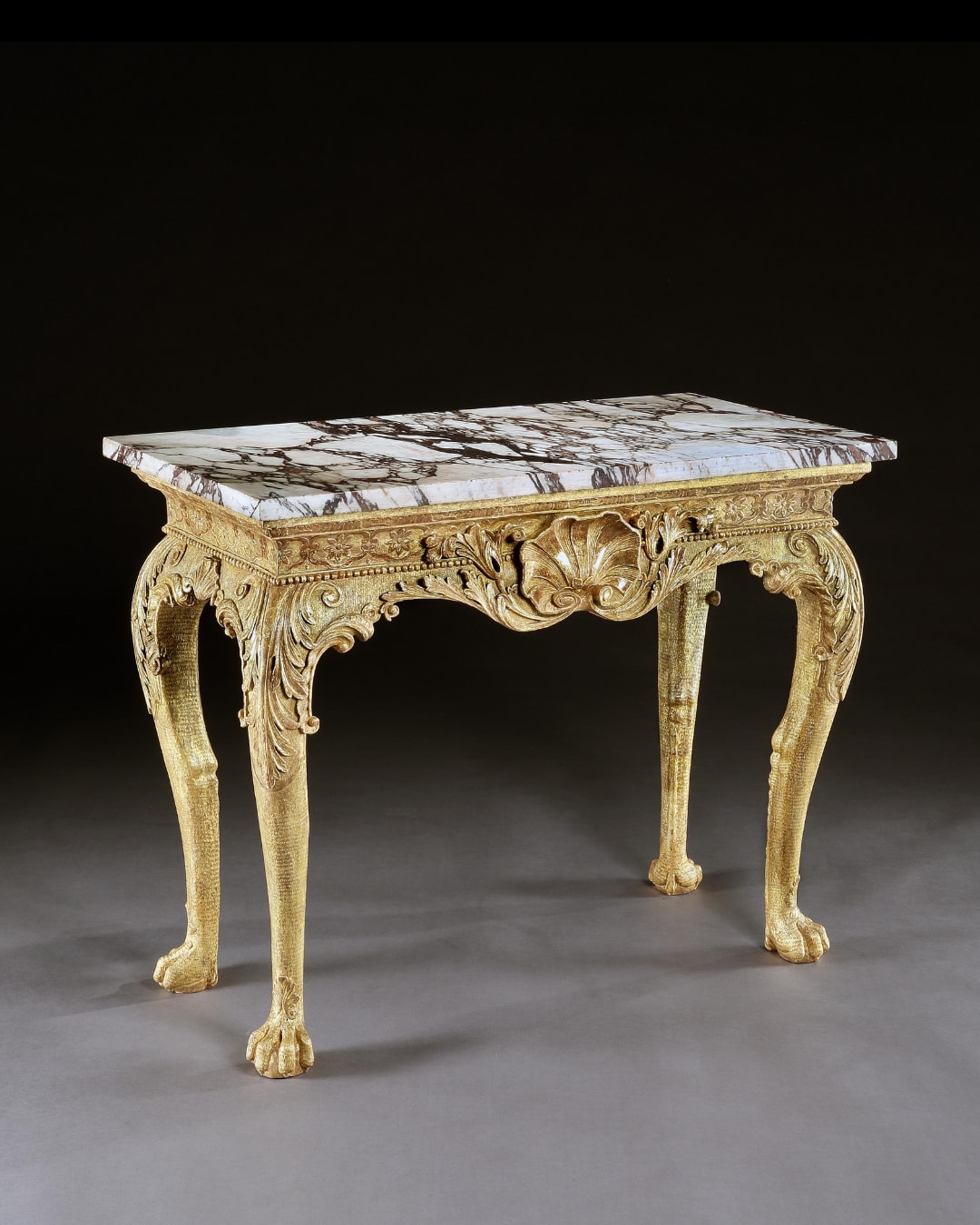 A GEORGE II GILTWOOD SIDE TABLE, English, circa 1735