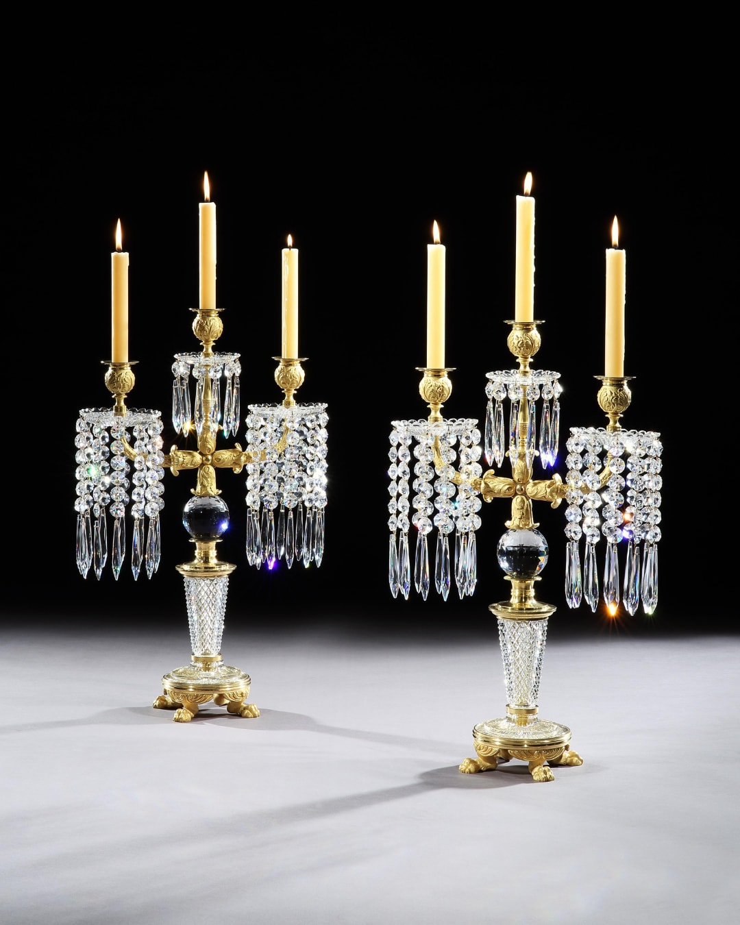 A PAIR OF REGENCY CUT GLASS CANDELABRA, English, circa 1820
