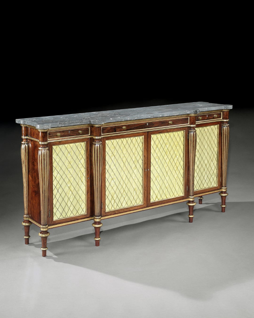 A REGENCY PARCEL GILT ROSEWOOD SIDE CABINET, English, circa 1815