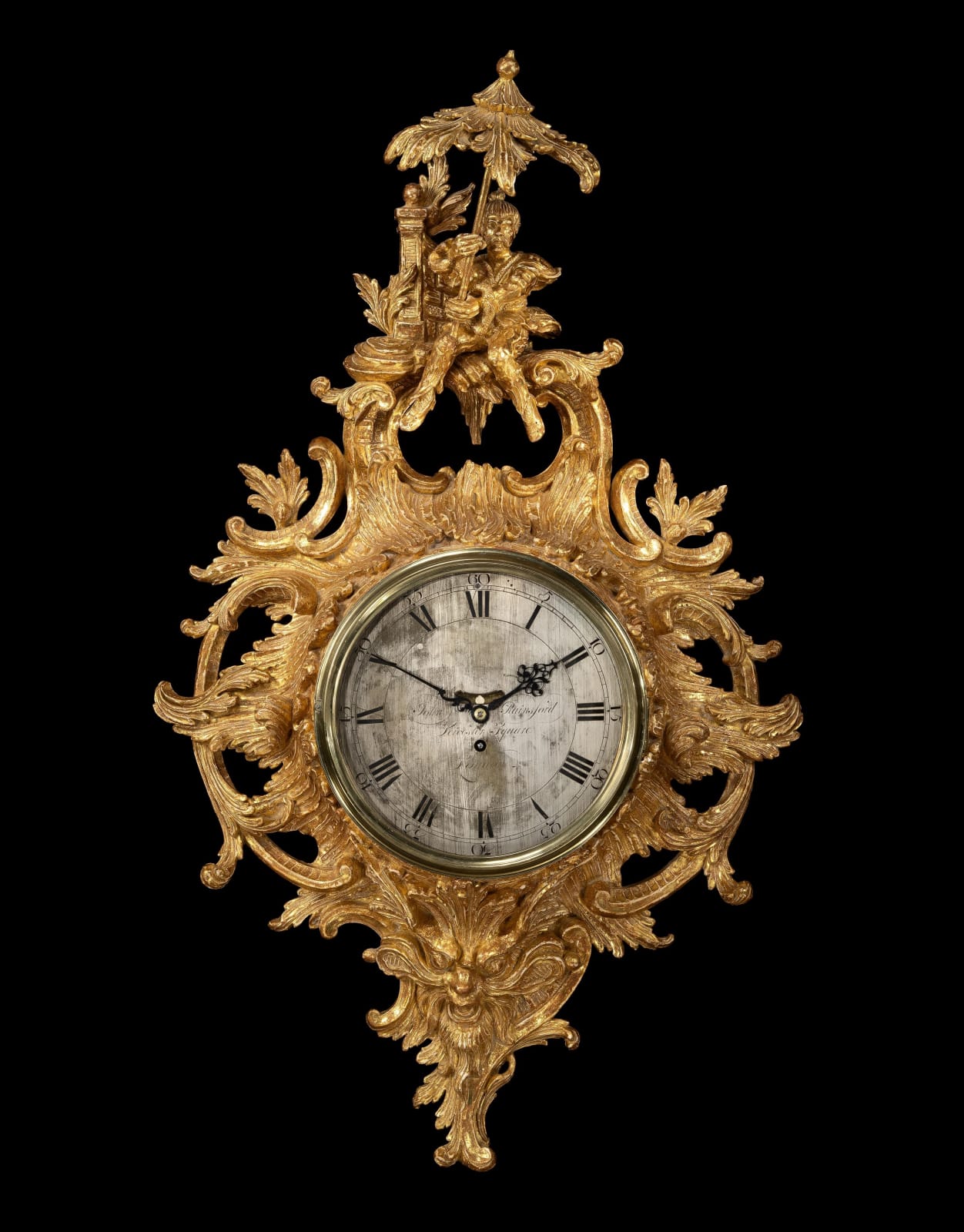A GEORGE II GILTWOOD CARTEL CLOCK, English, circa 1755