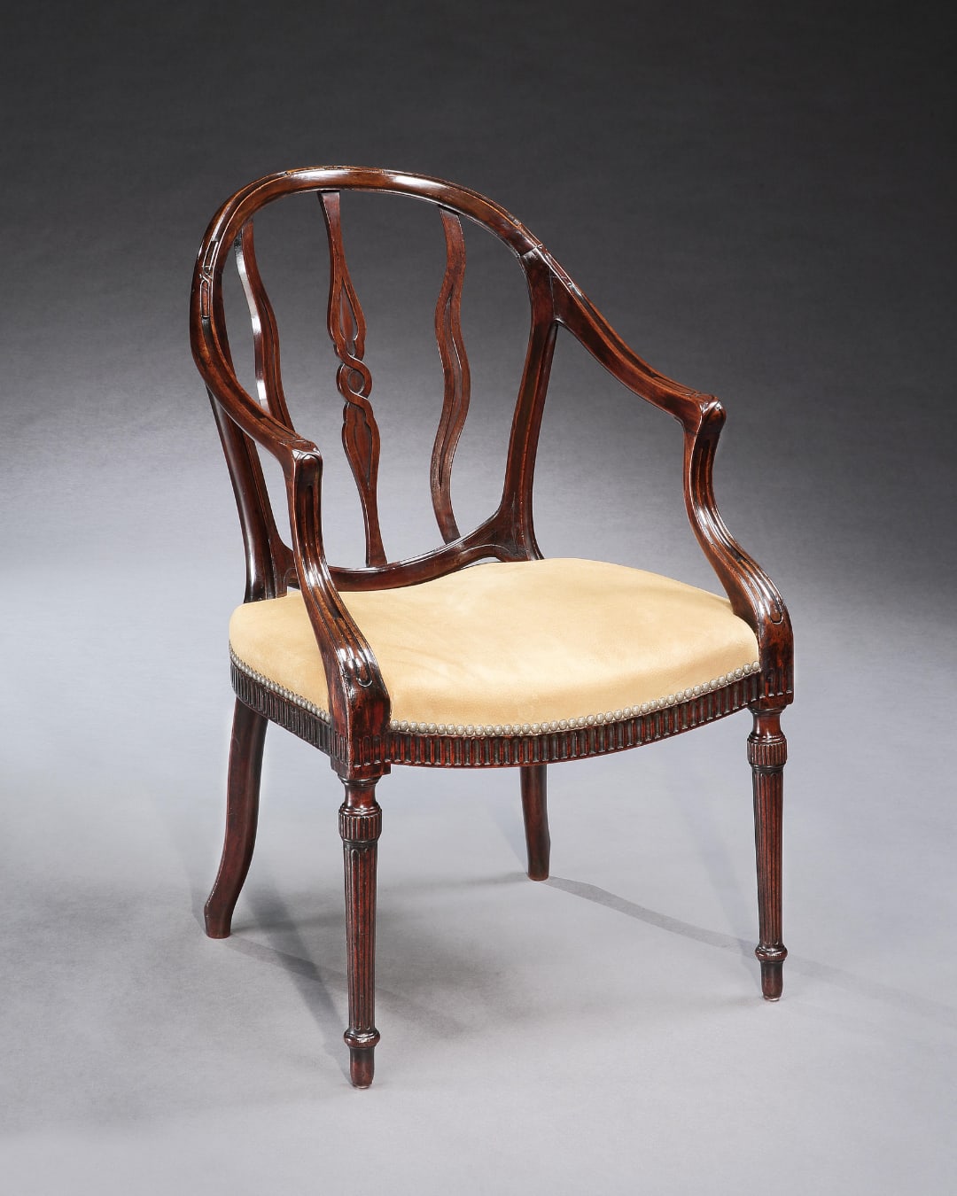 A GEORGE III MAHOGANY ARMCHAIR, English, circa 1790