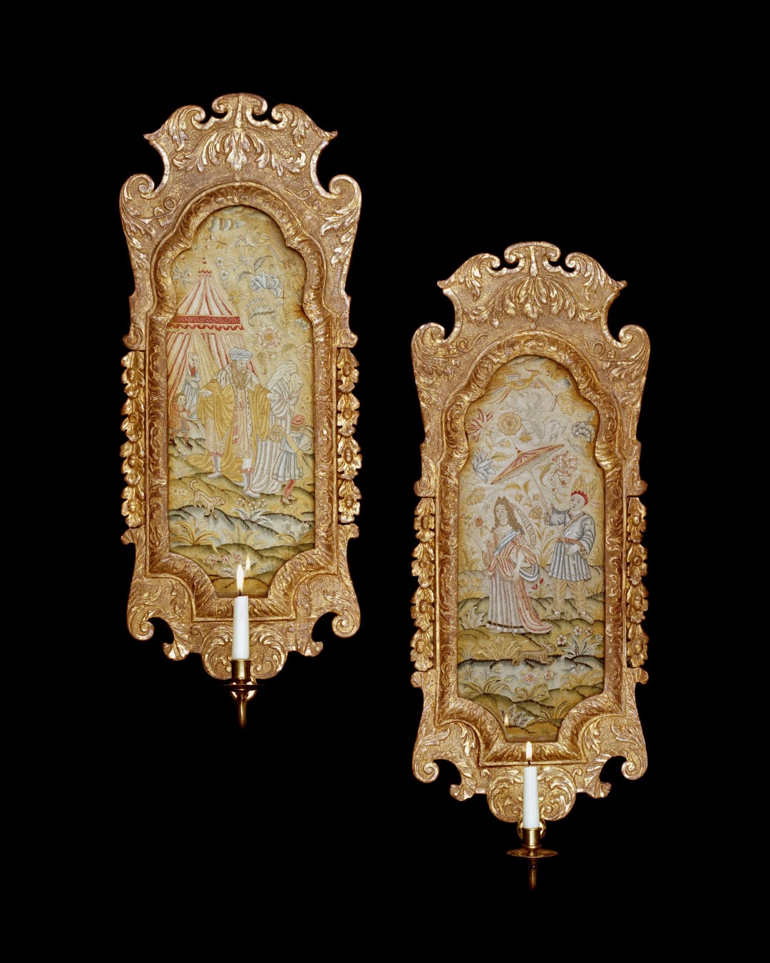 A PAIR OF QUEEN ANNE SCONCES WITH NEEDLEWORK PANELS, The sconces: English, circa 1710  The needlework: English, circa 1710