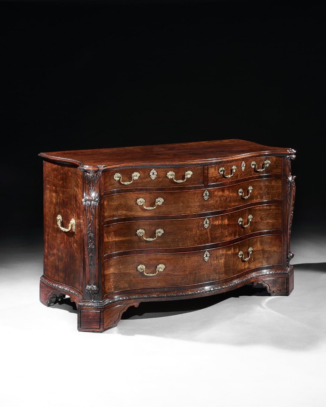 A GEORGE III MAHOGANY COMMODE, English, circa 1765