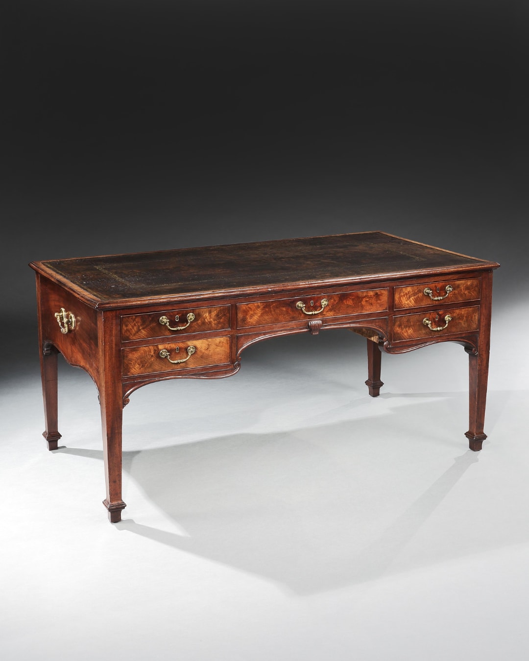 A GEORGE II MAHOGANY WRITING TABLE, English, circa 1755